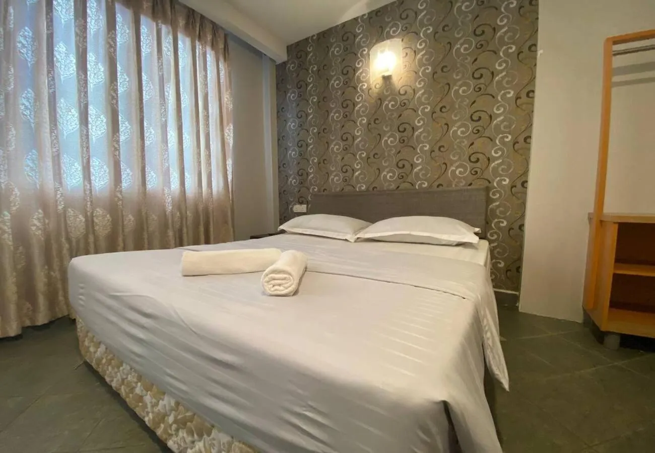 Bed in Hotel Harbour Inn