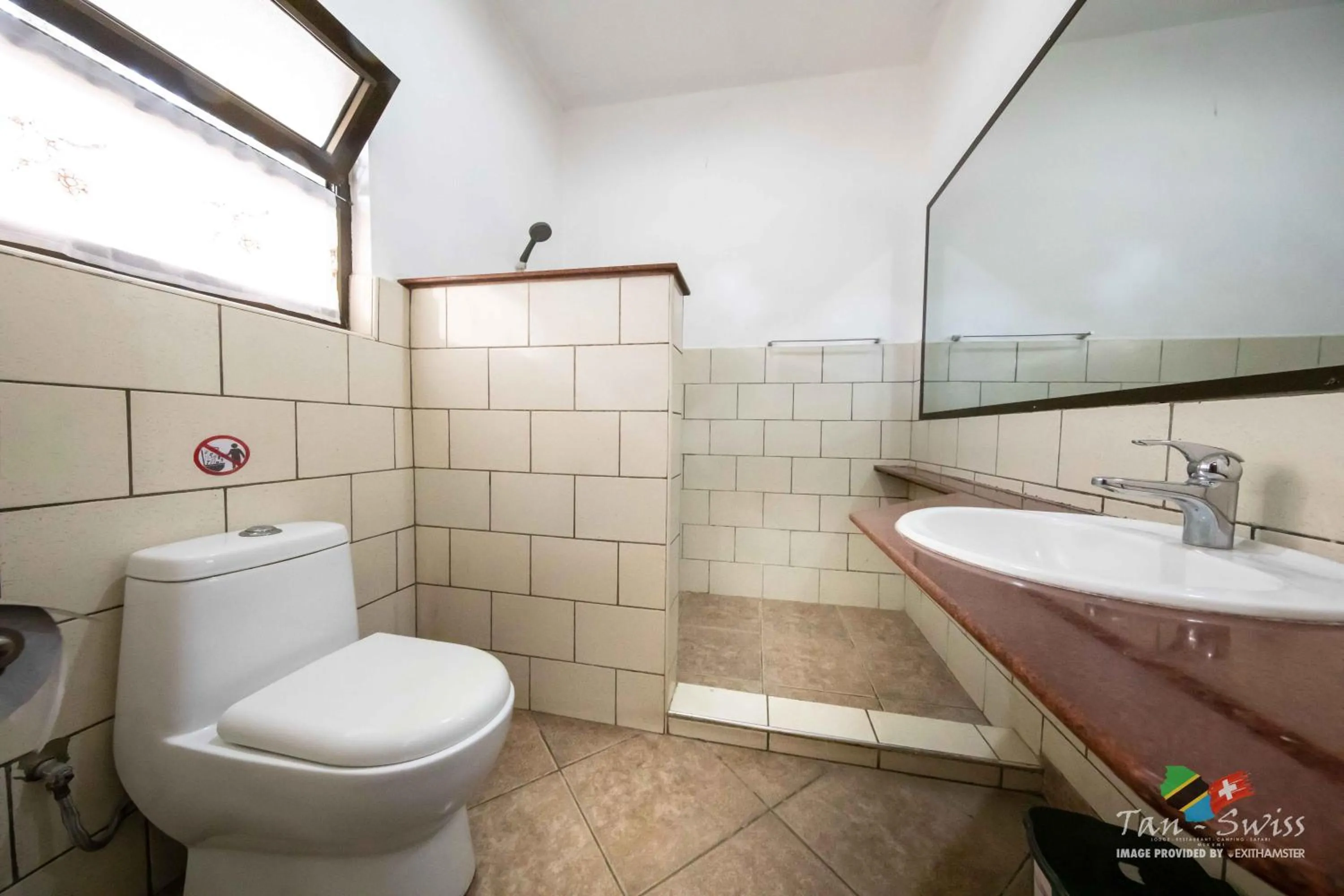 Bathroom in Tan-Swiss Lodge