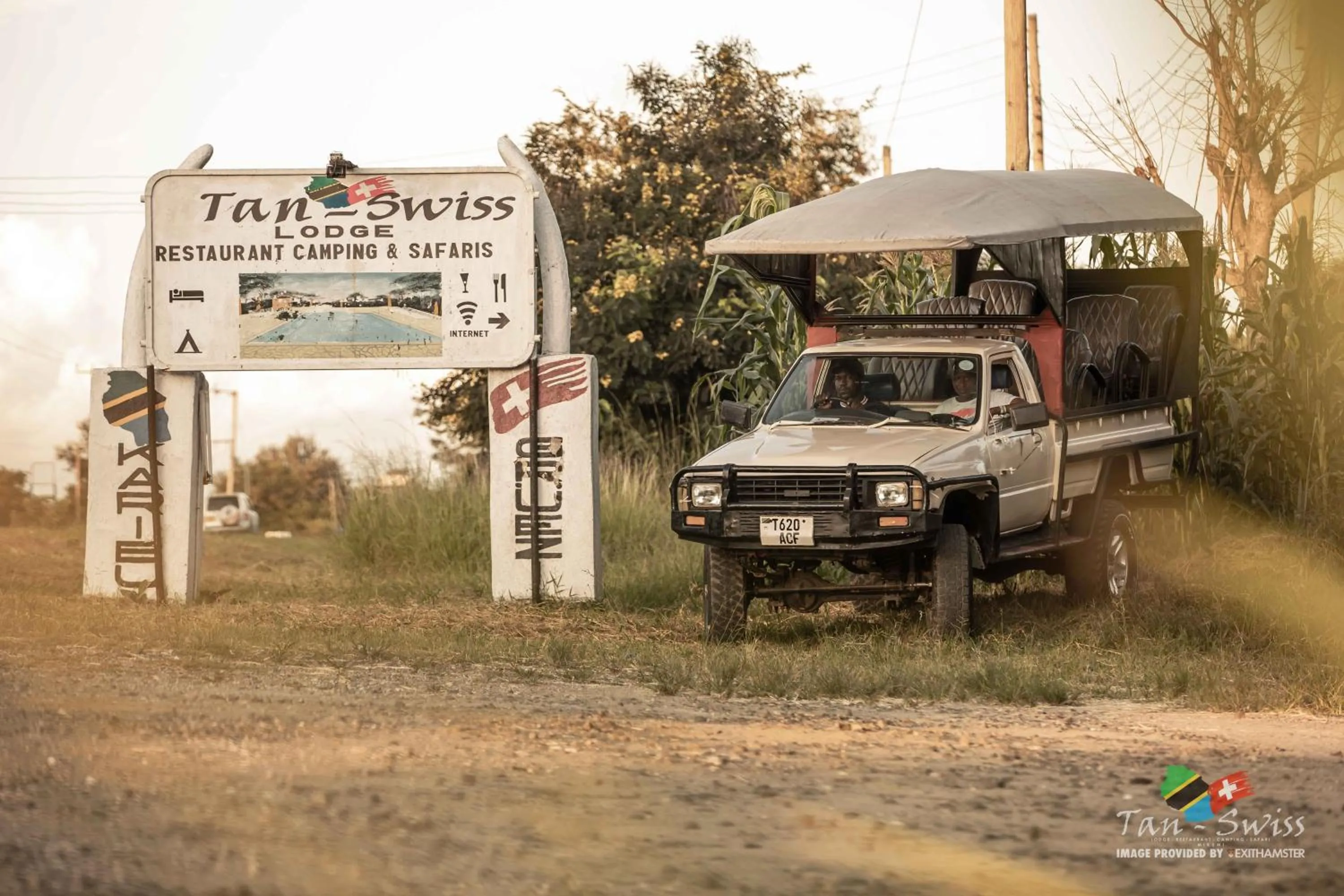 Property logo or sign in Tan-Swiss Lodge