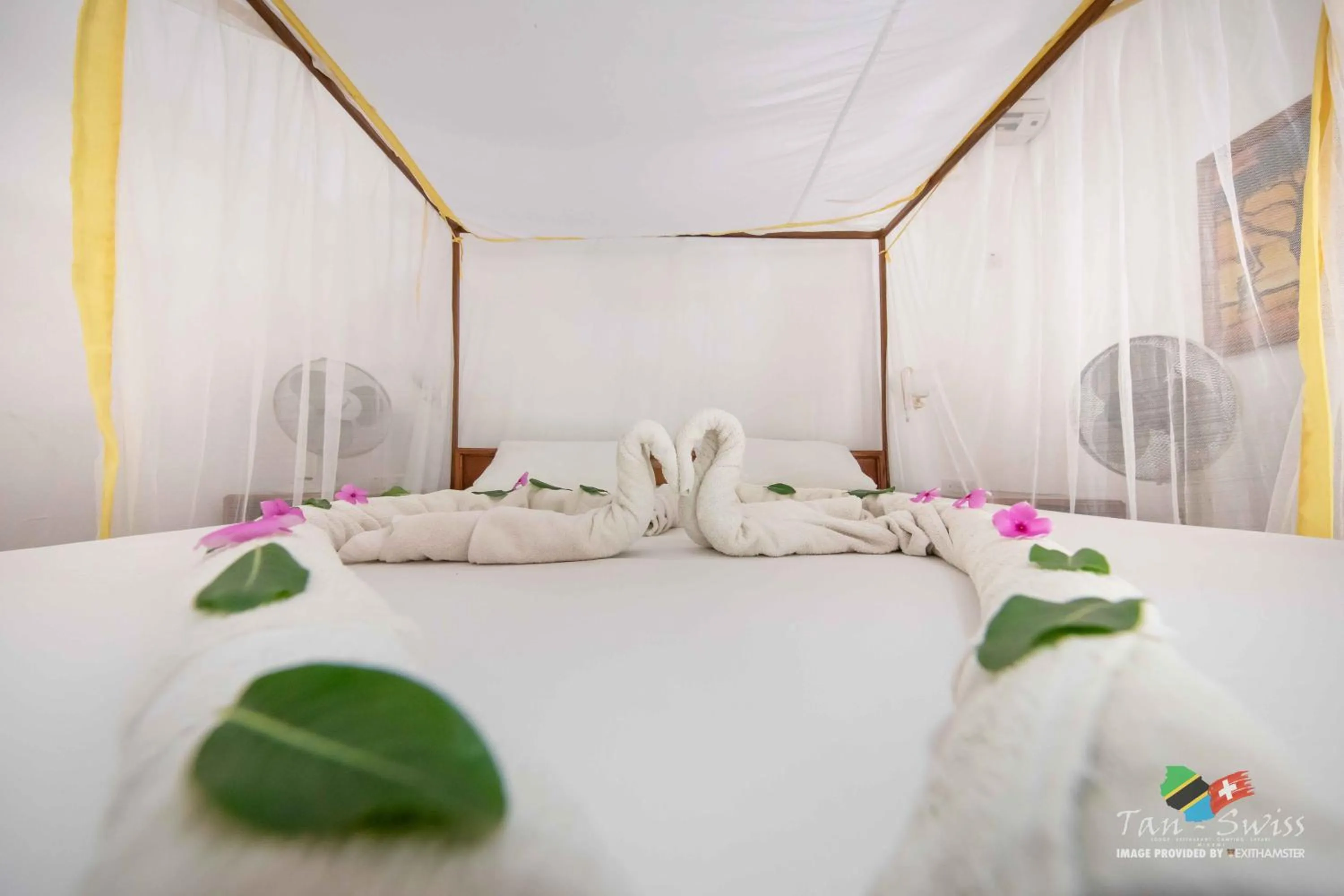 Bed in Tan-Swiss Lodge