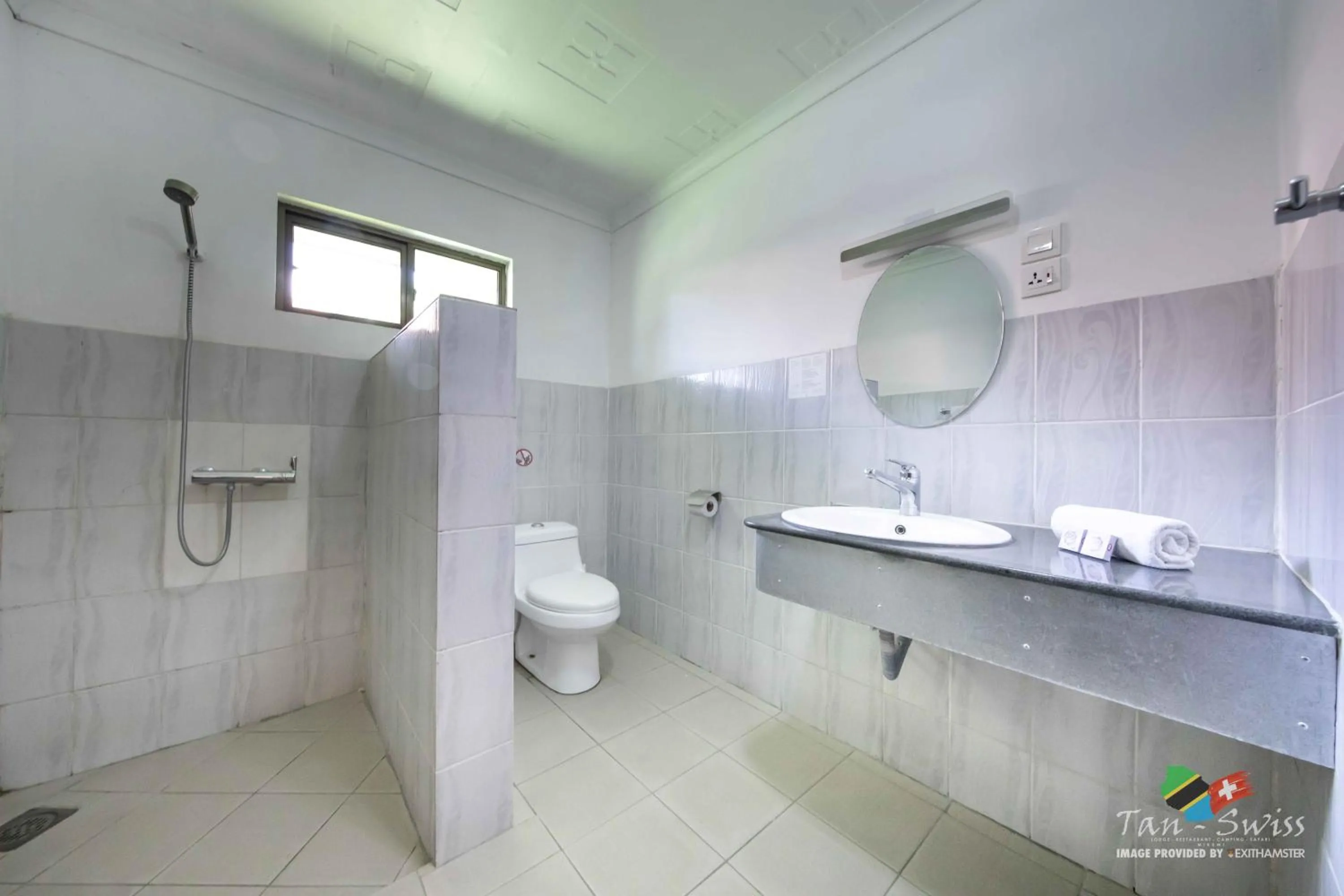 Bathroom in Tan-Swiss Lodge