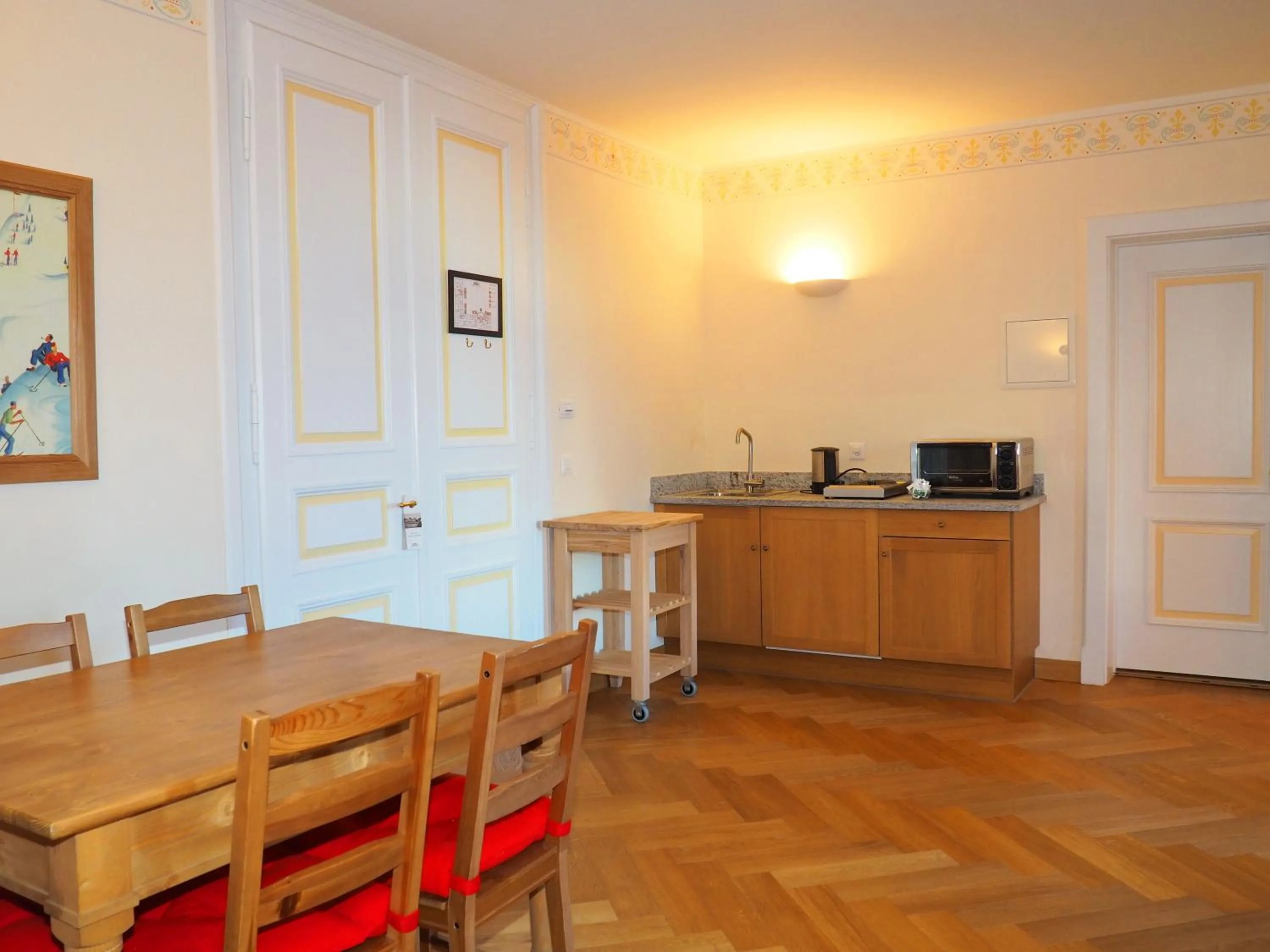 Kitchen or kitchenette in Maloja Palace Residence Engadin-St Moritz CO2-Neutral