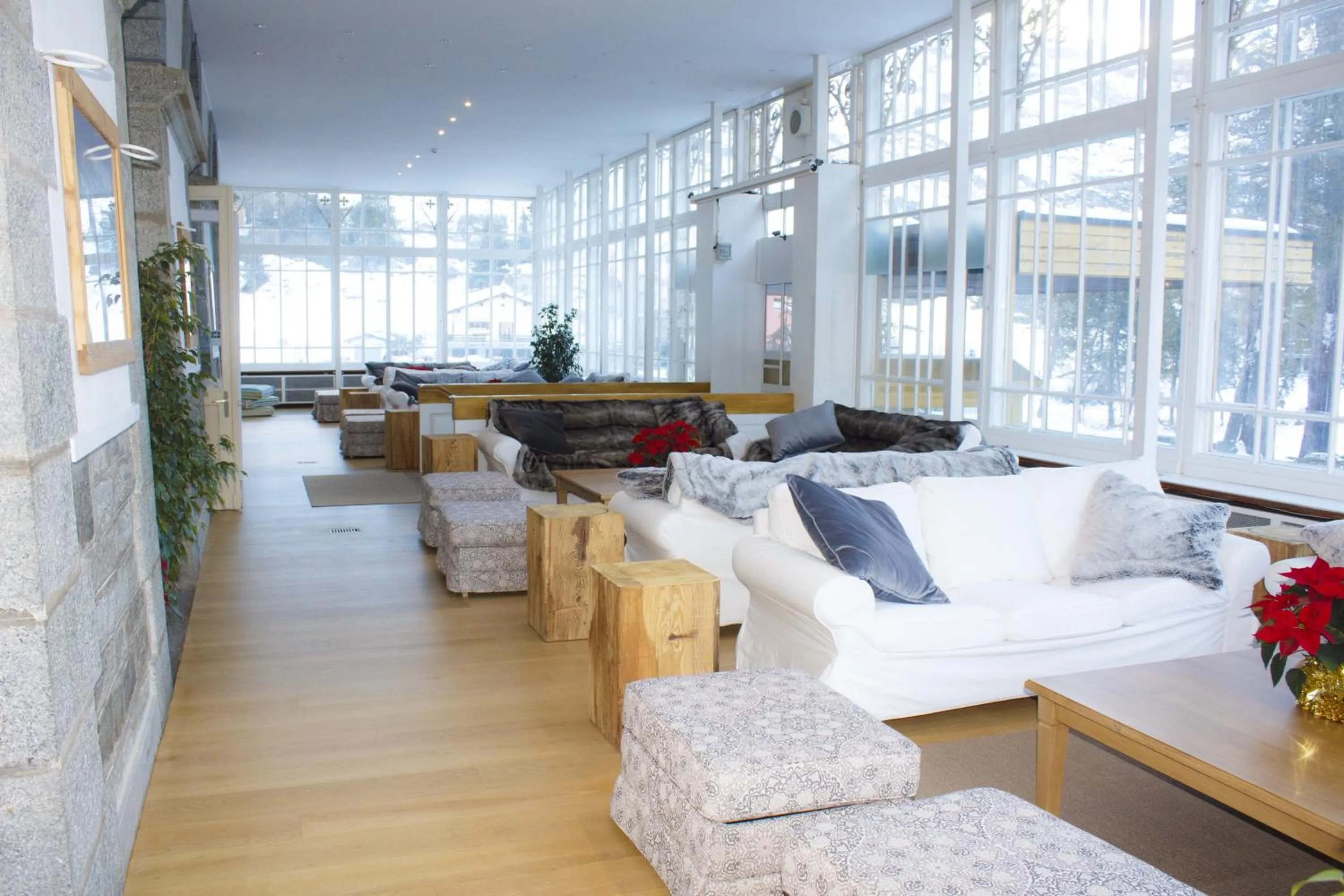 Lounge or bar in Maloja Palace Residence Engadin-St Moritz CO2-Neutral