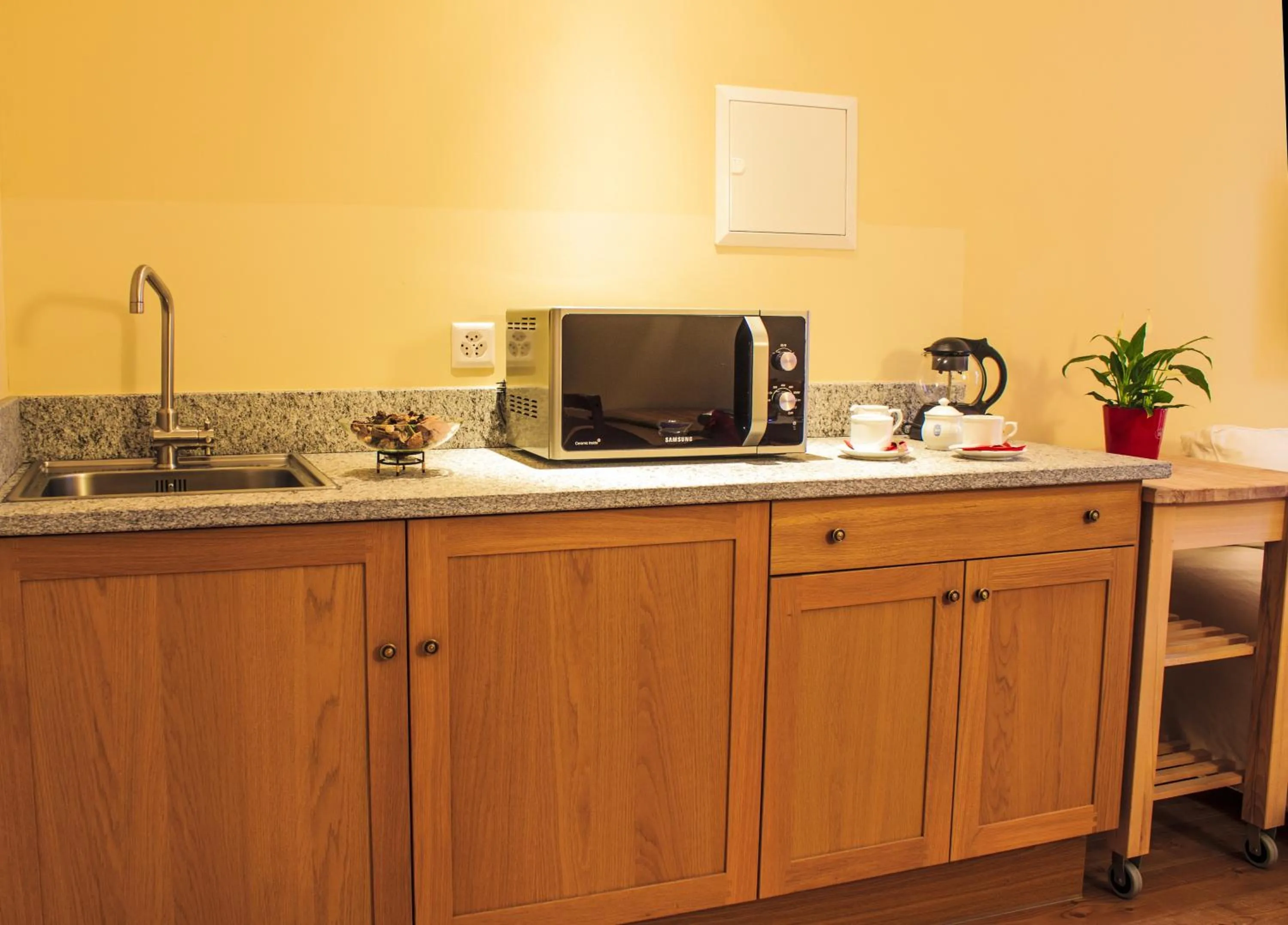 Kitchen or kitchenette in Maloja Palace Residence Engadin-St Moritz CO2-Neutral