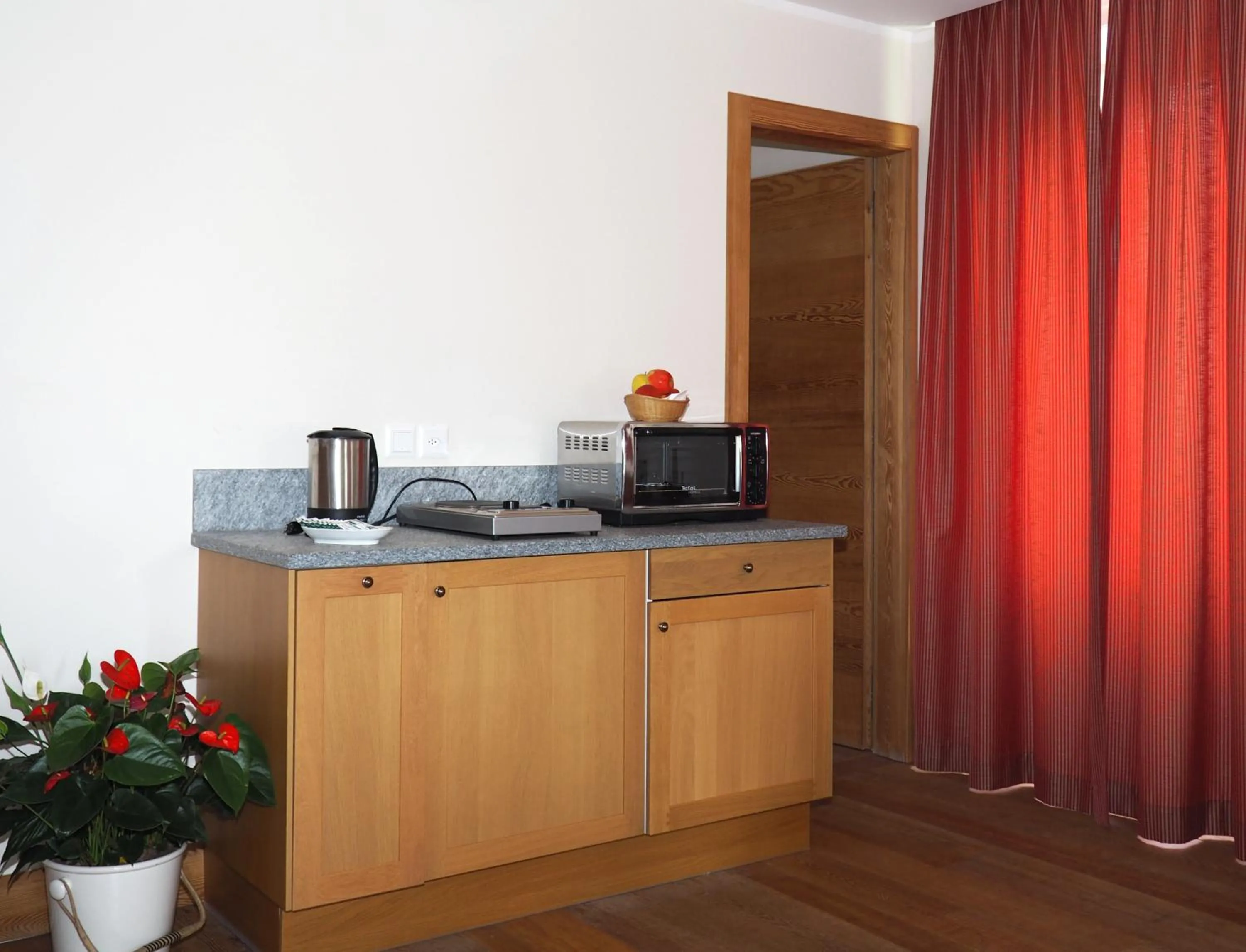 Kitchen or kitchenette in Maloja Palace Residence Engadin-St Moritz CO2-Neutral