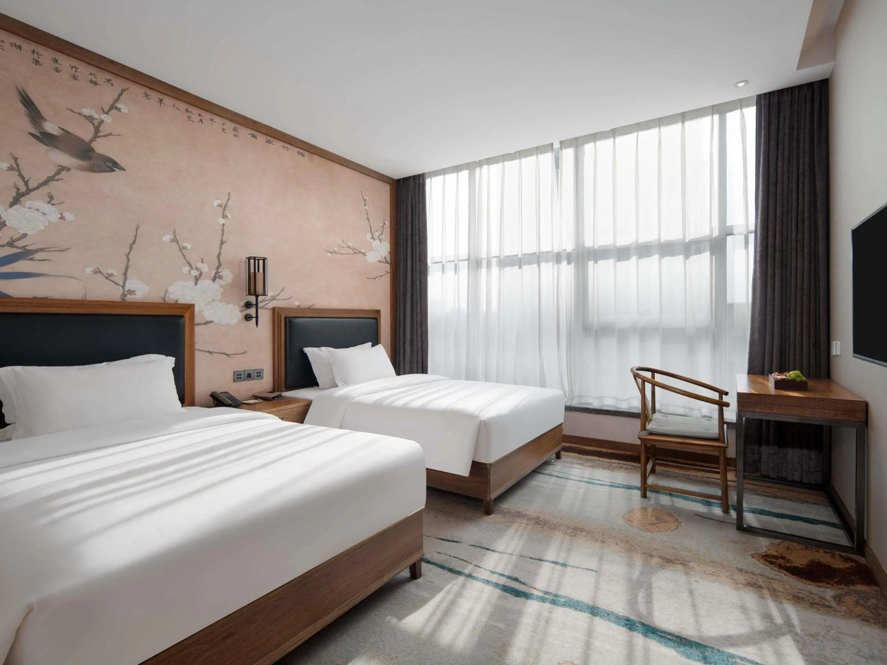 Photo of the whole room, Bed in Grand Mercure Kunming South