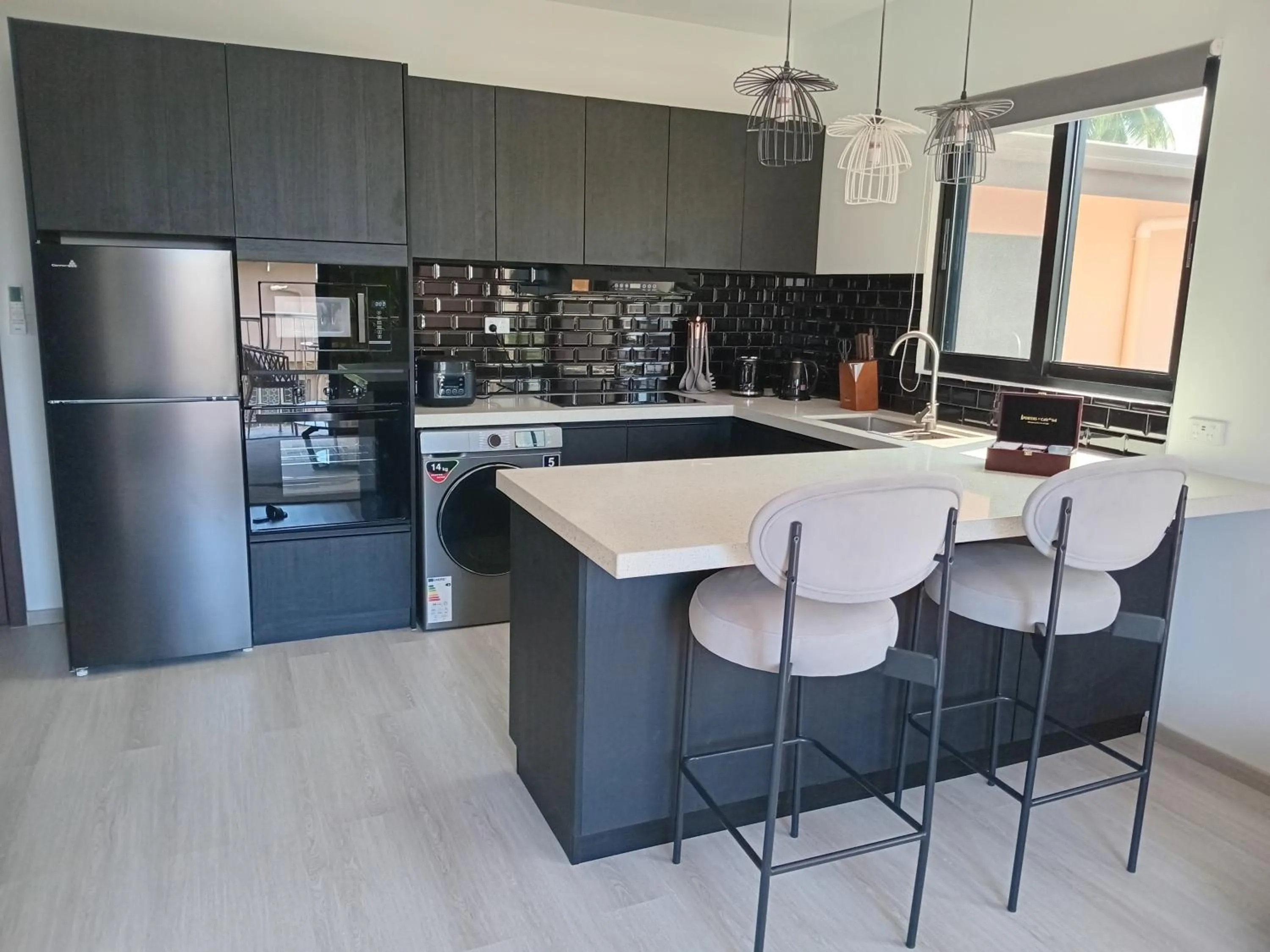 Dining area in Hibiscus Suites And Residences