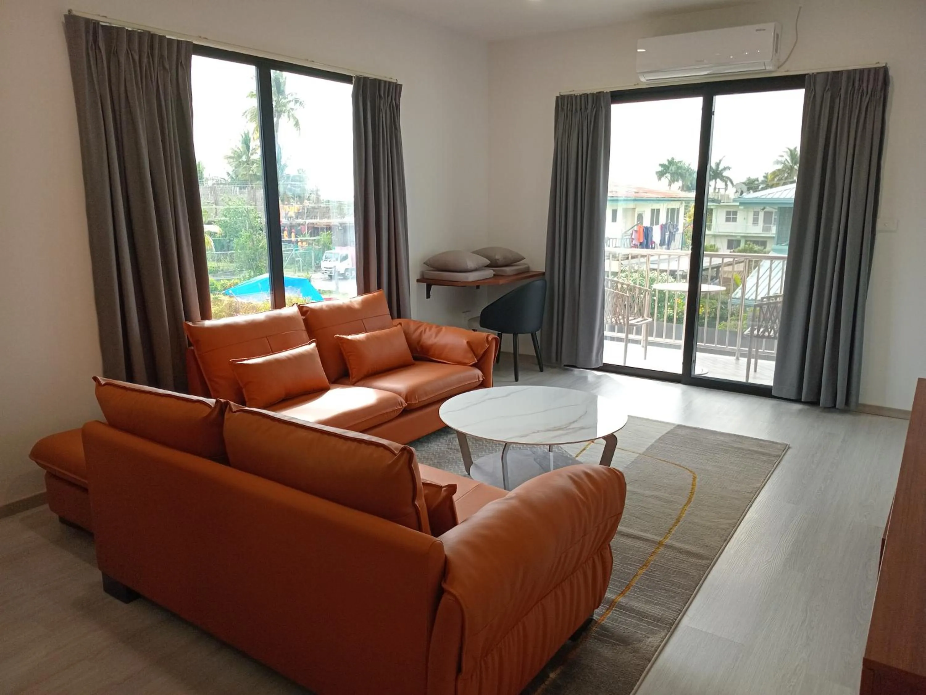 Living room in Hibiscus Suites And Residences