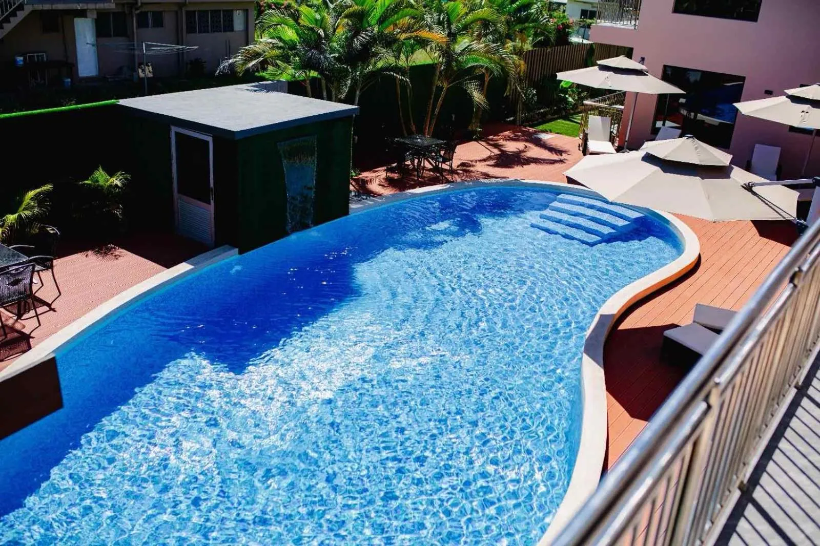 Swimming pool in Hibiscus Suites And Residences