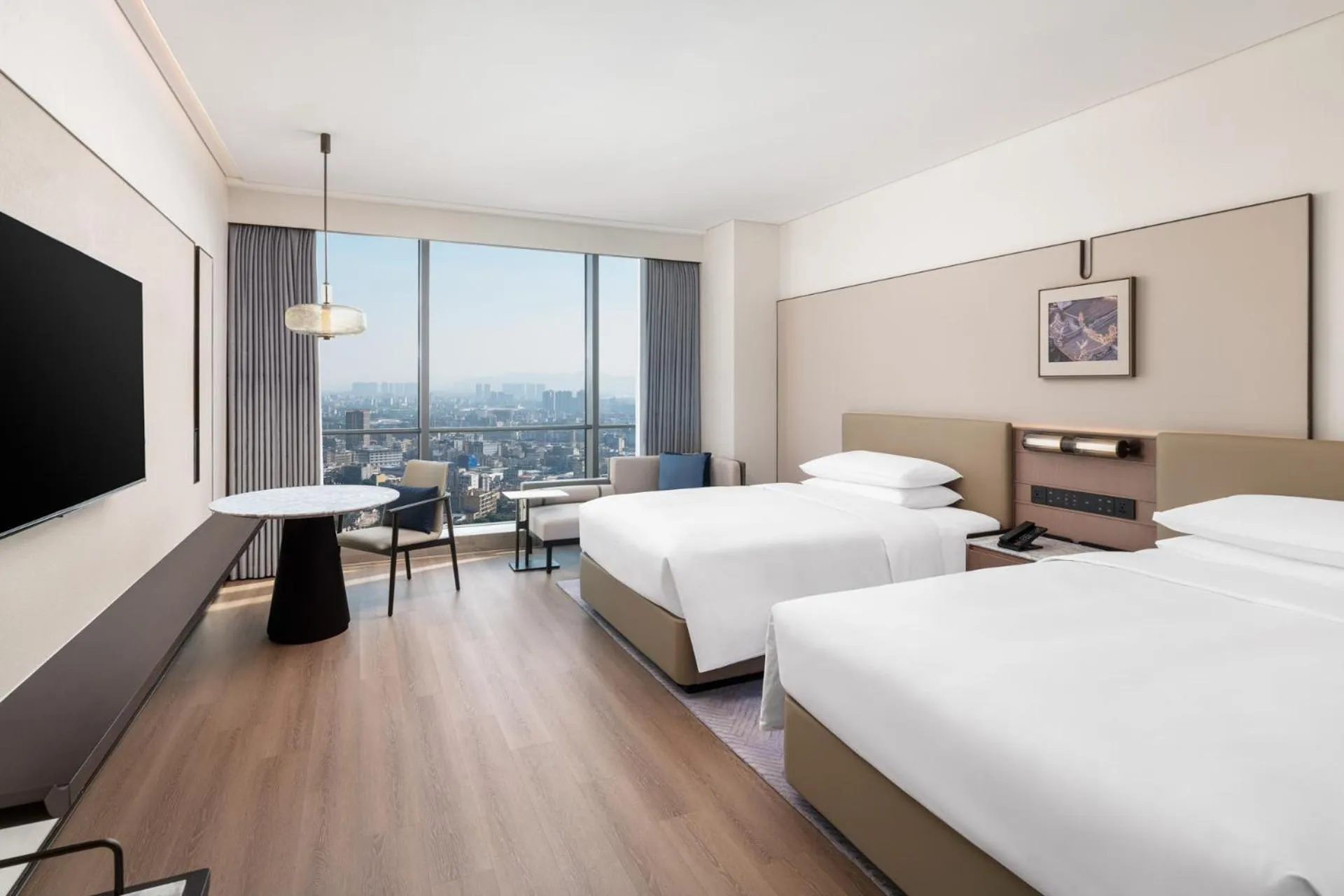 Bed in Jieyang Marriott Hotel