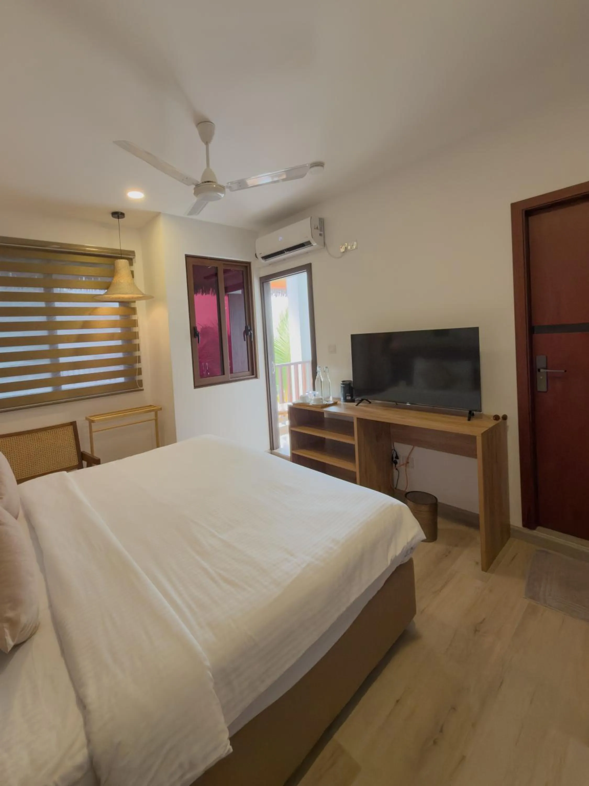 Bed in Cocomo Maldives