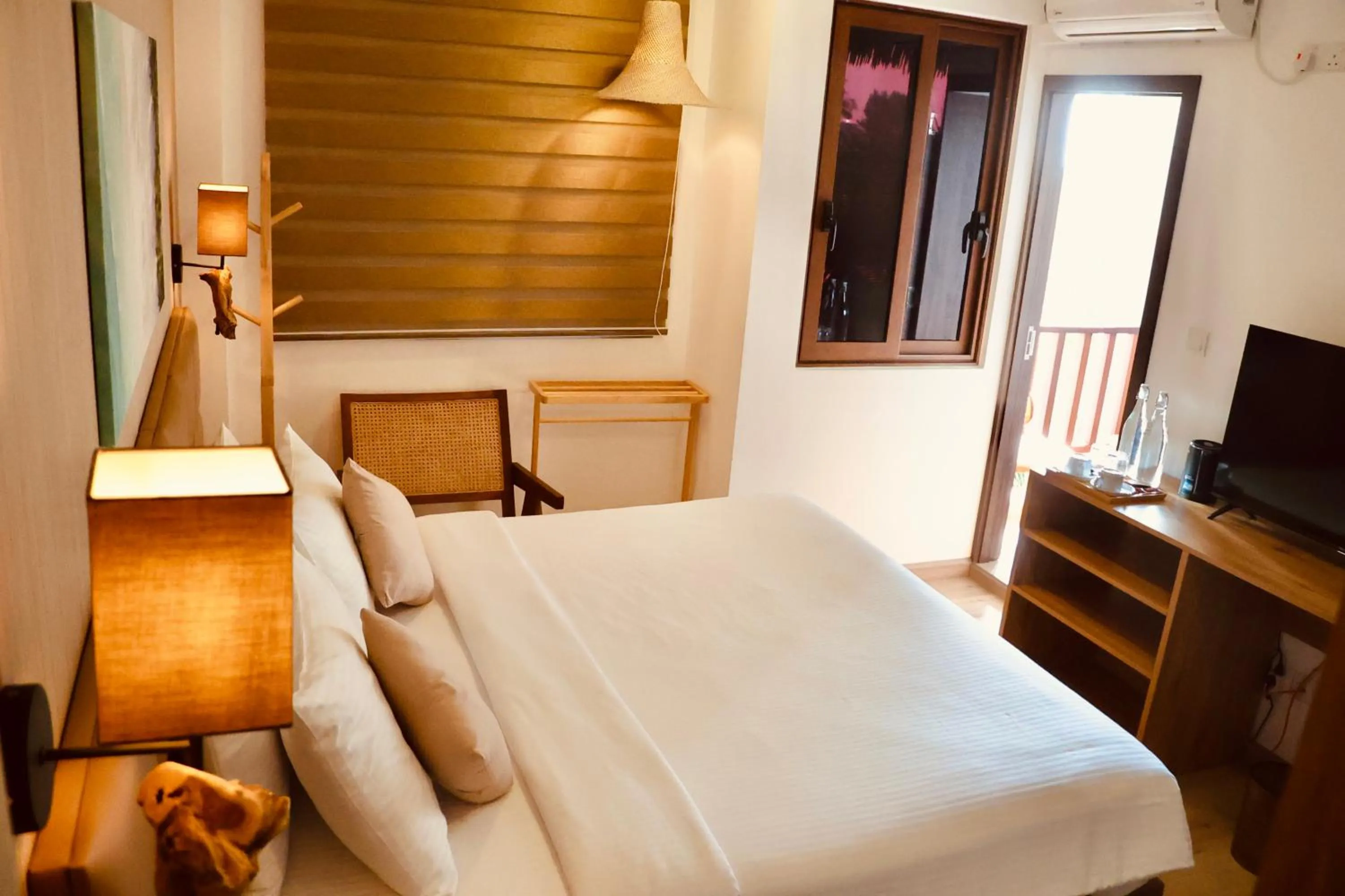 Bed in Cocomo Maldives