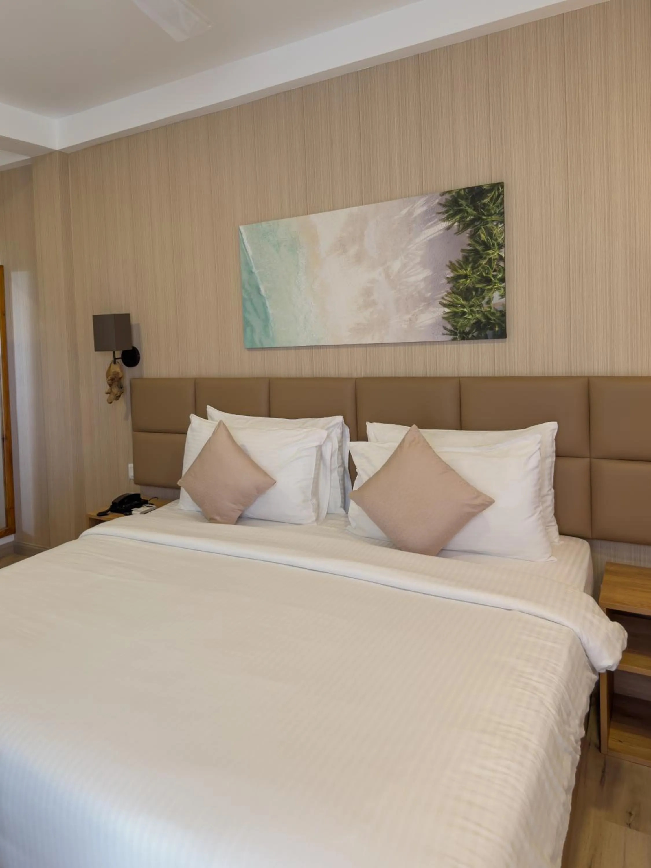 Bed in Cocomo Maldives