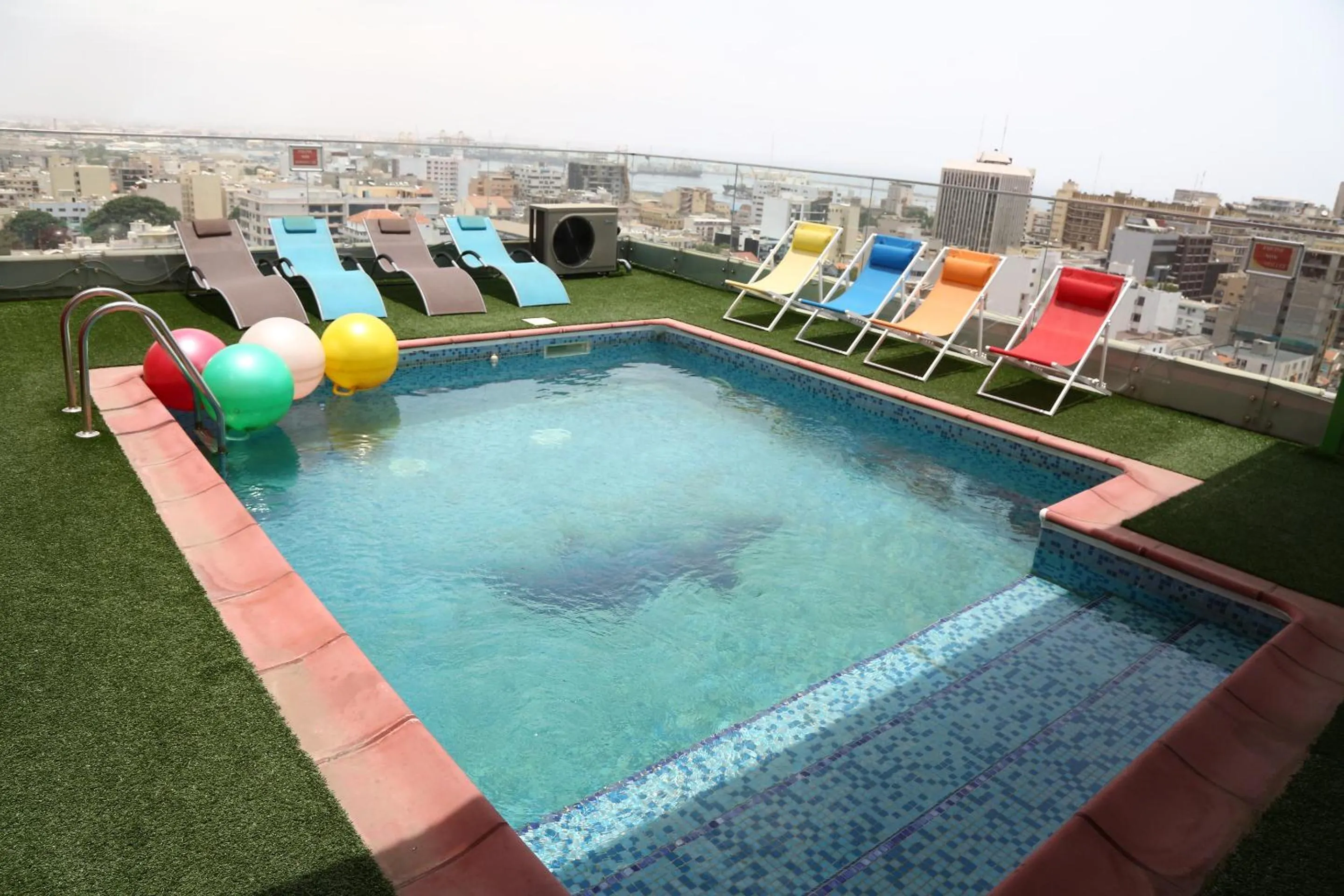 Swimming pool in Hôtel Fleur de Lys Plateau