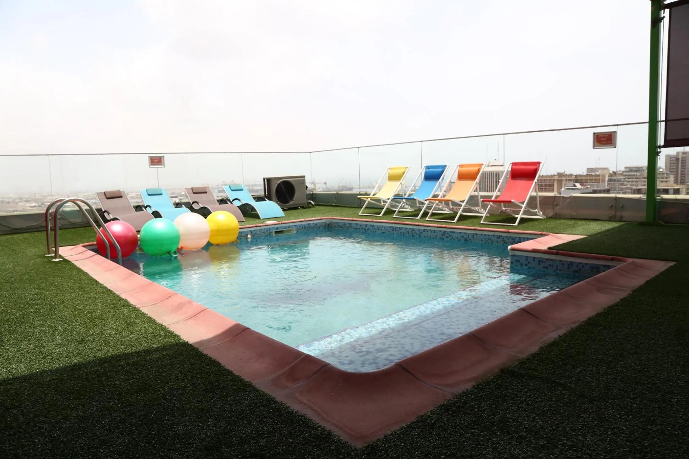 Swimming pool in Hôtel Fleur de Lys Plateau