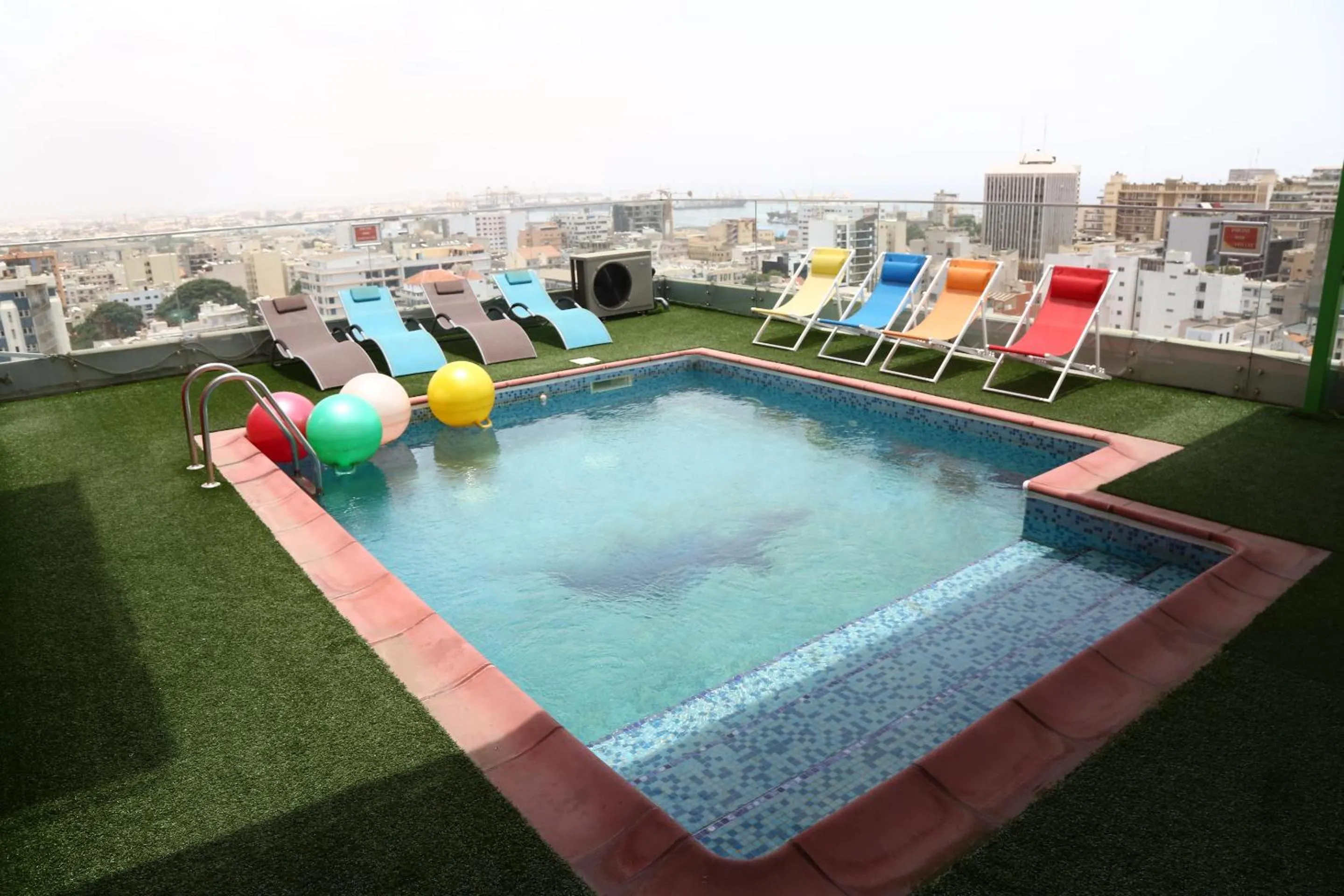 Swimming pool in Hôtel Fleur de Lys Plateau