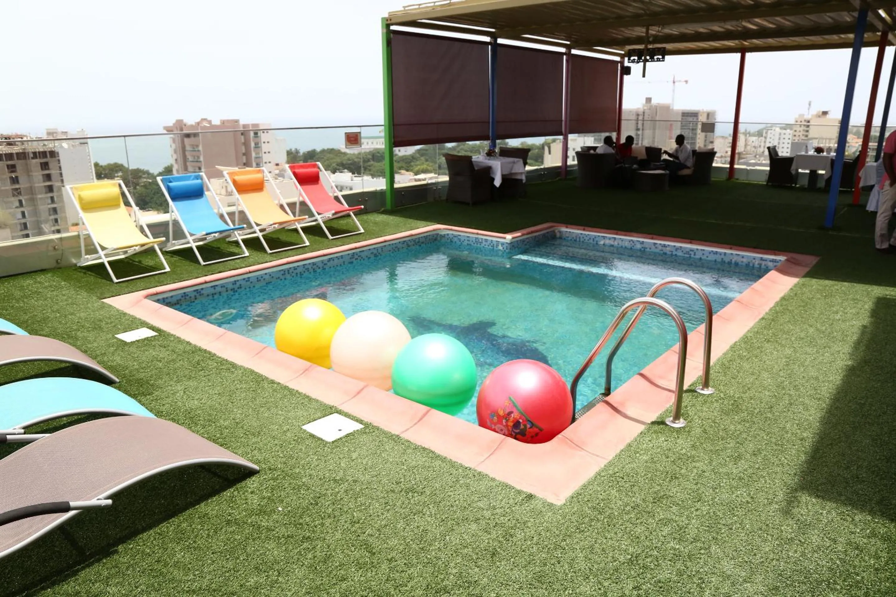 Swimming pool in Hôtel Fleur de Lys Plateau