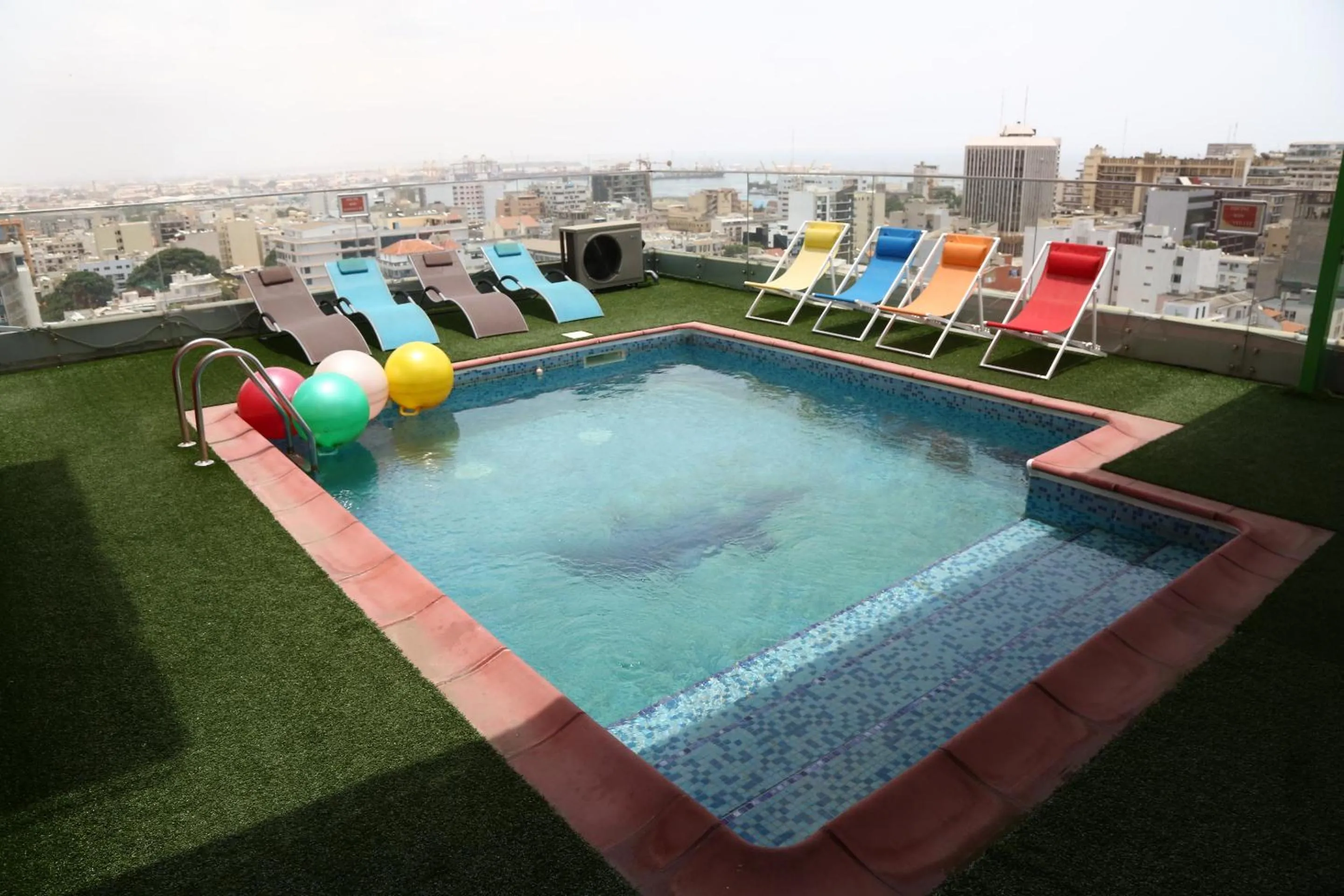 Swimming pool in Hôtel Fleur de Lys Plateau