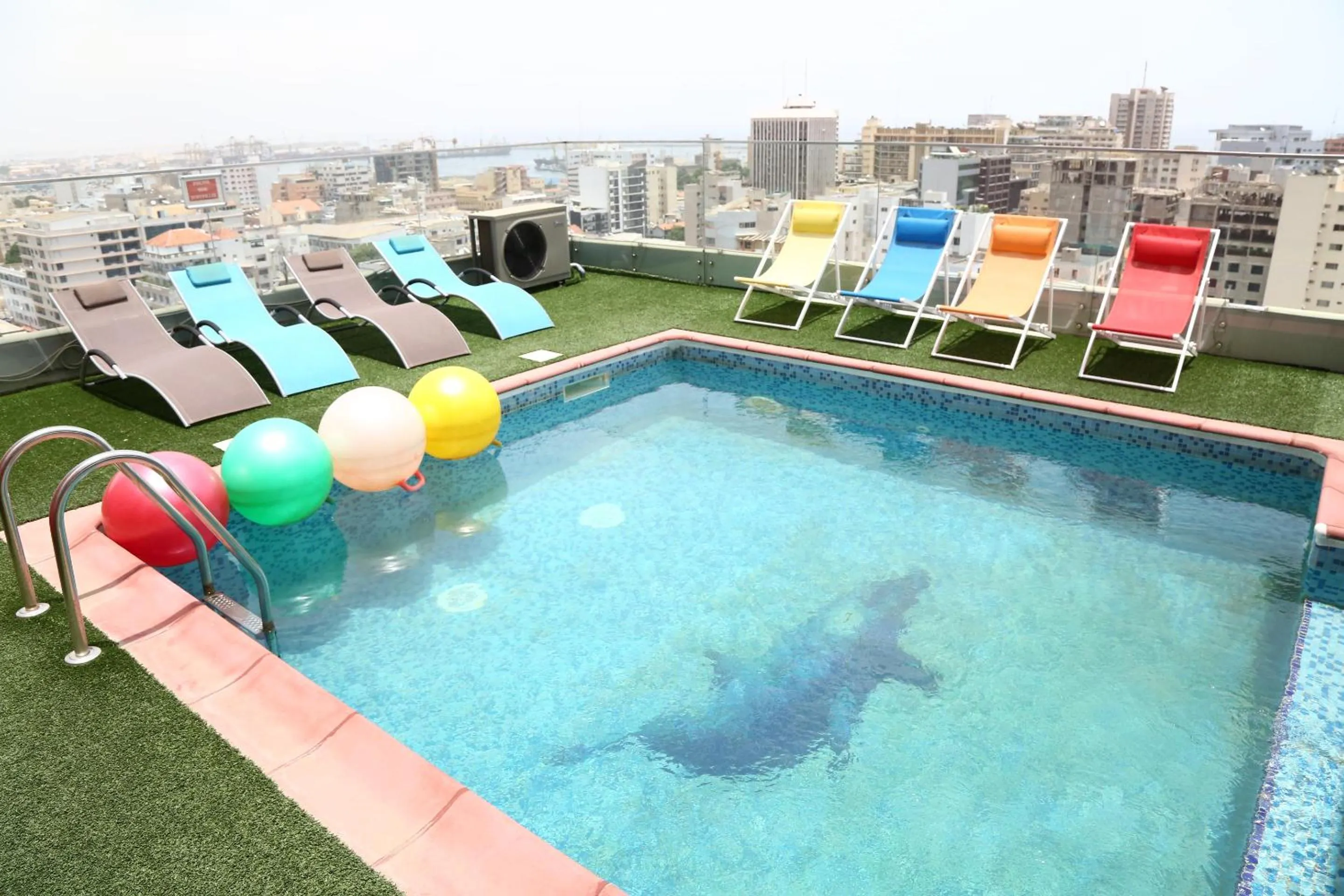 Swimming pool in Hôtel Fleur de Lys Plateau