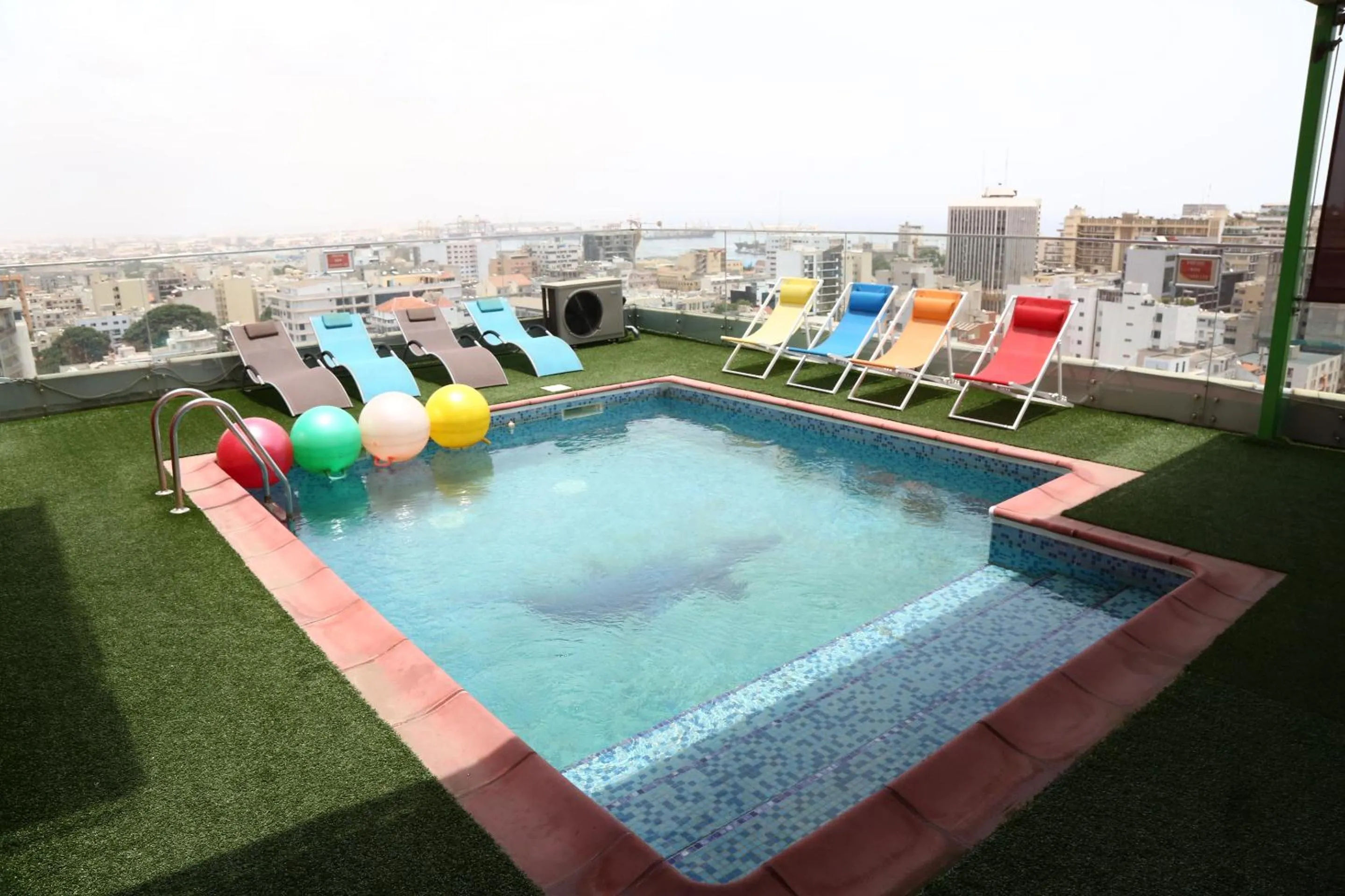 Swimming pool in Hôtel Fleur de Lys Plateau