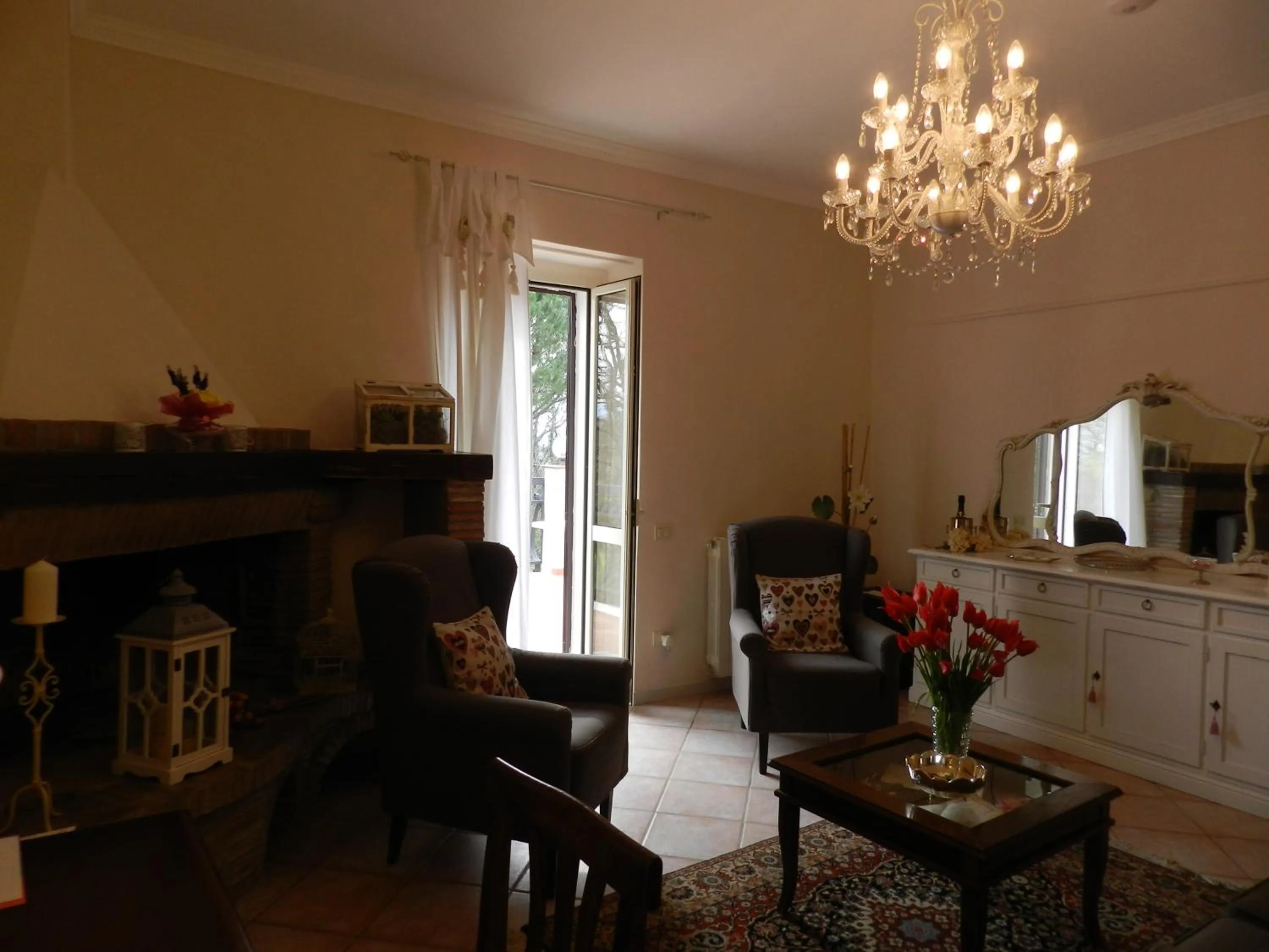 Communal lounge/ TV room in B&B Villa Maria