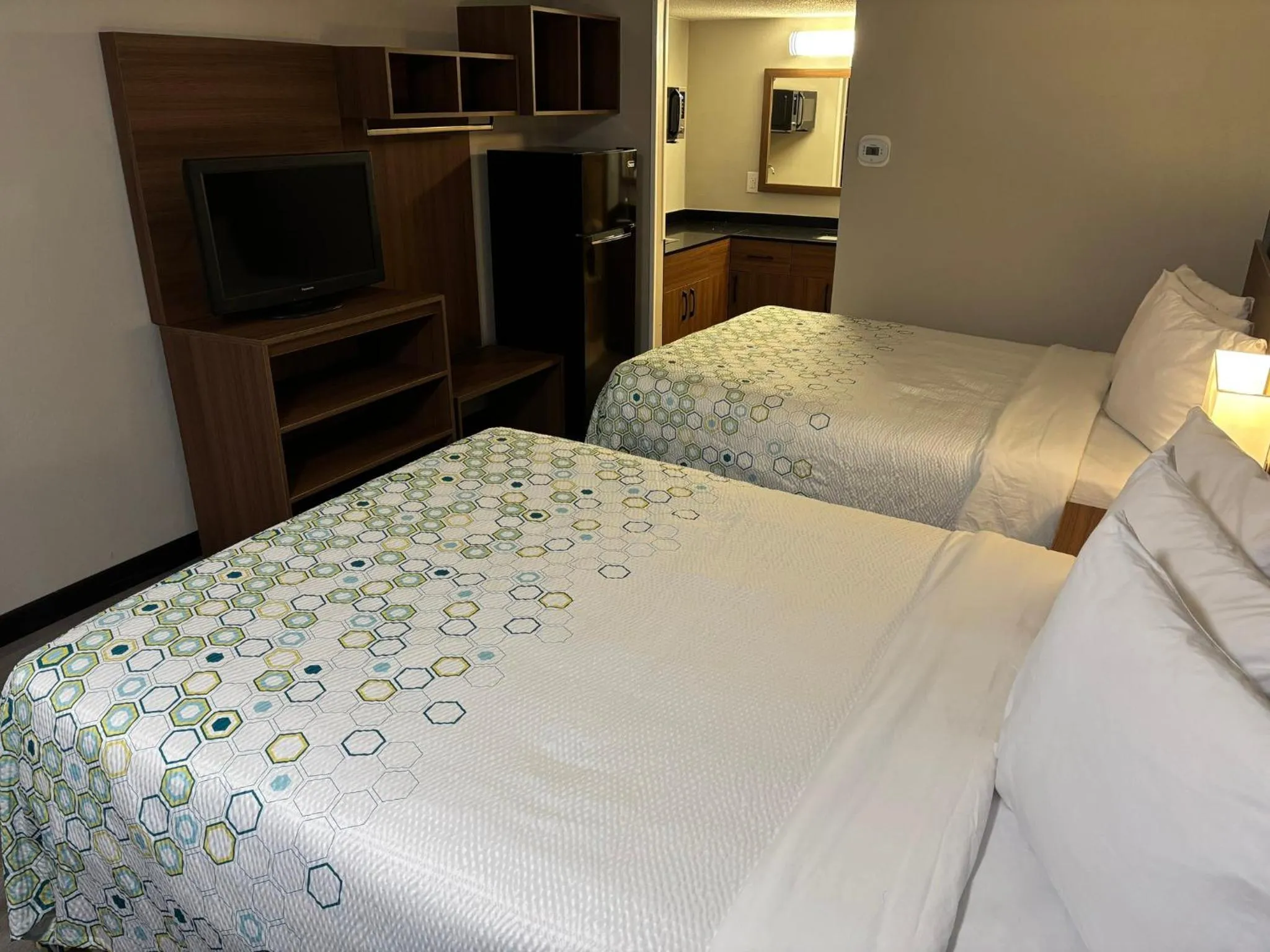 Bedroom, Bed in HomeTowne Studios by Red Roof Hagerstown - Williamsport, MD