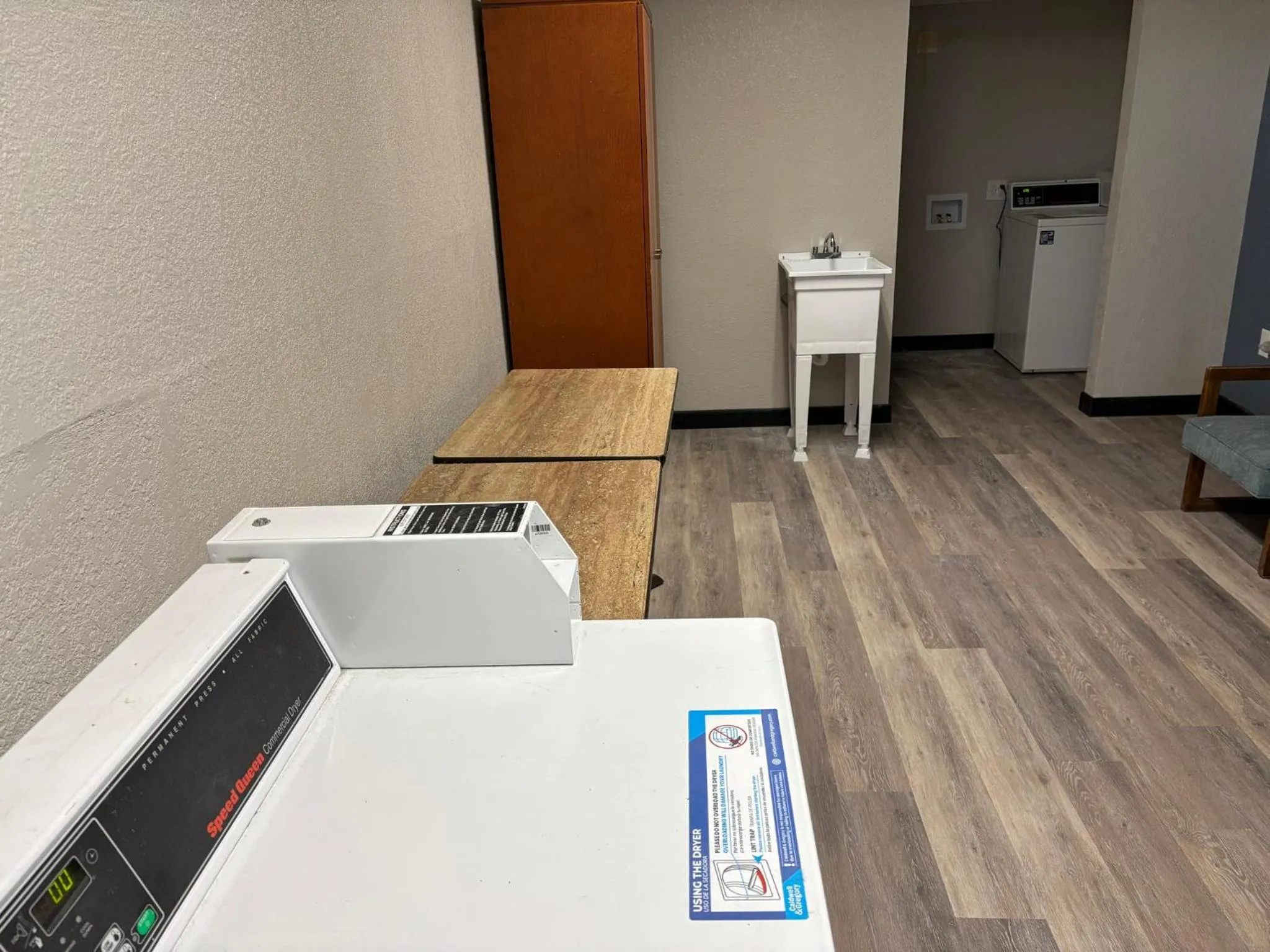 laundry in HomeTowne Studios by Red Roof Hagerstown - Williamsport, MD