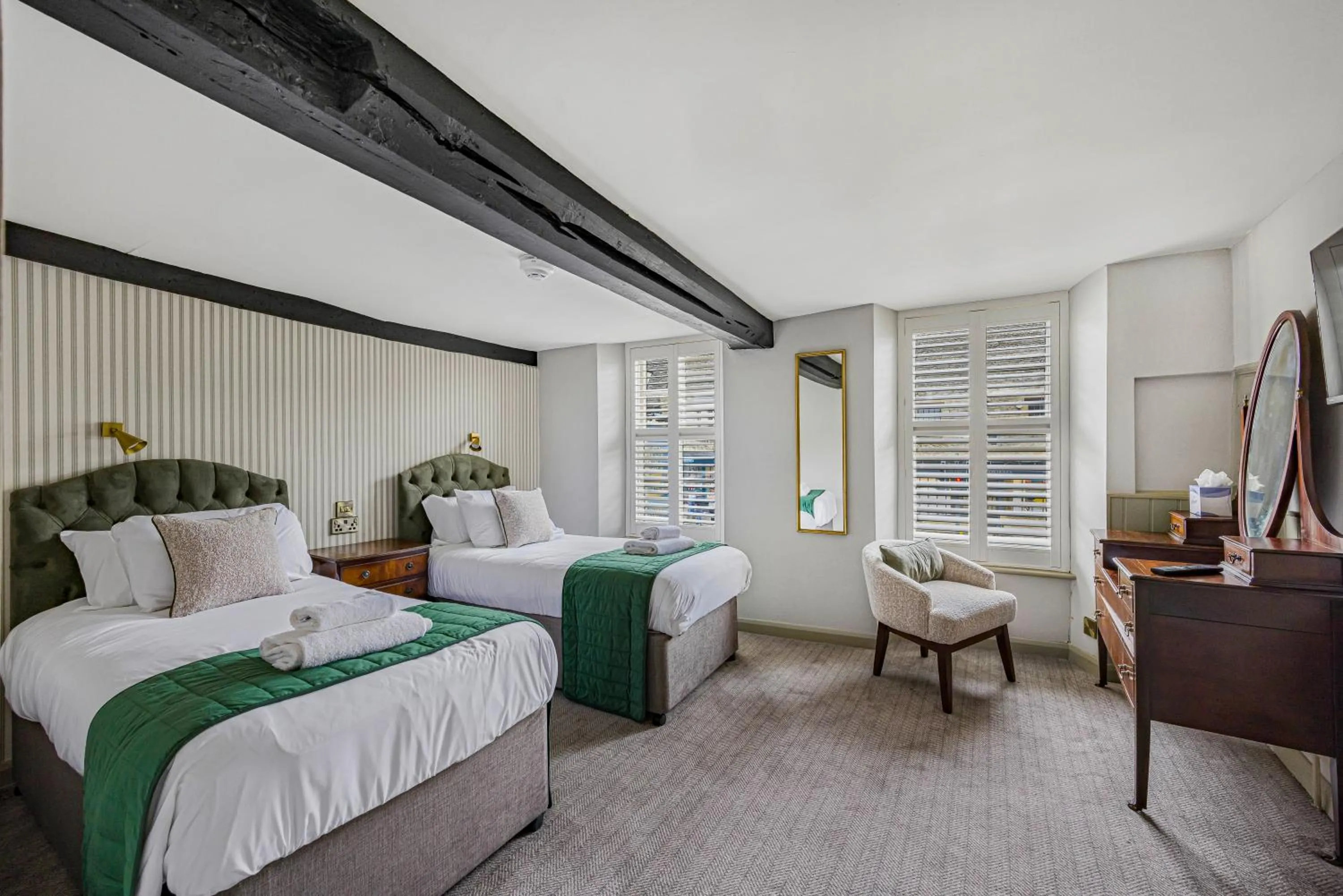 Bed in The Golden Pheasant Inn