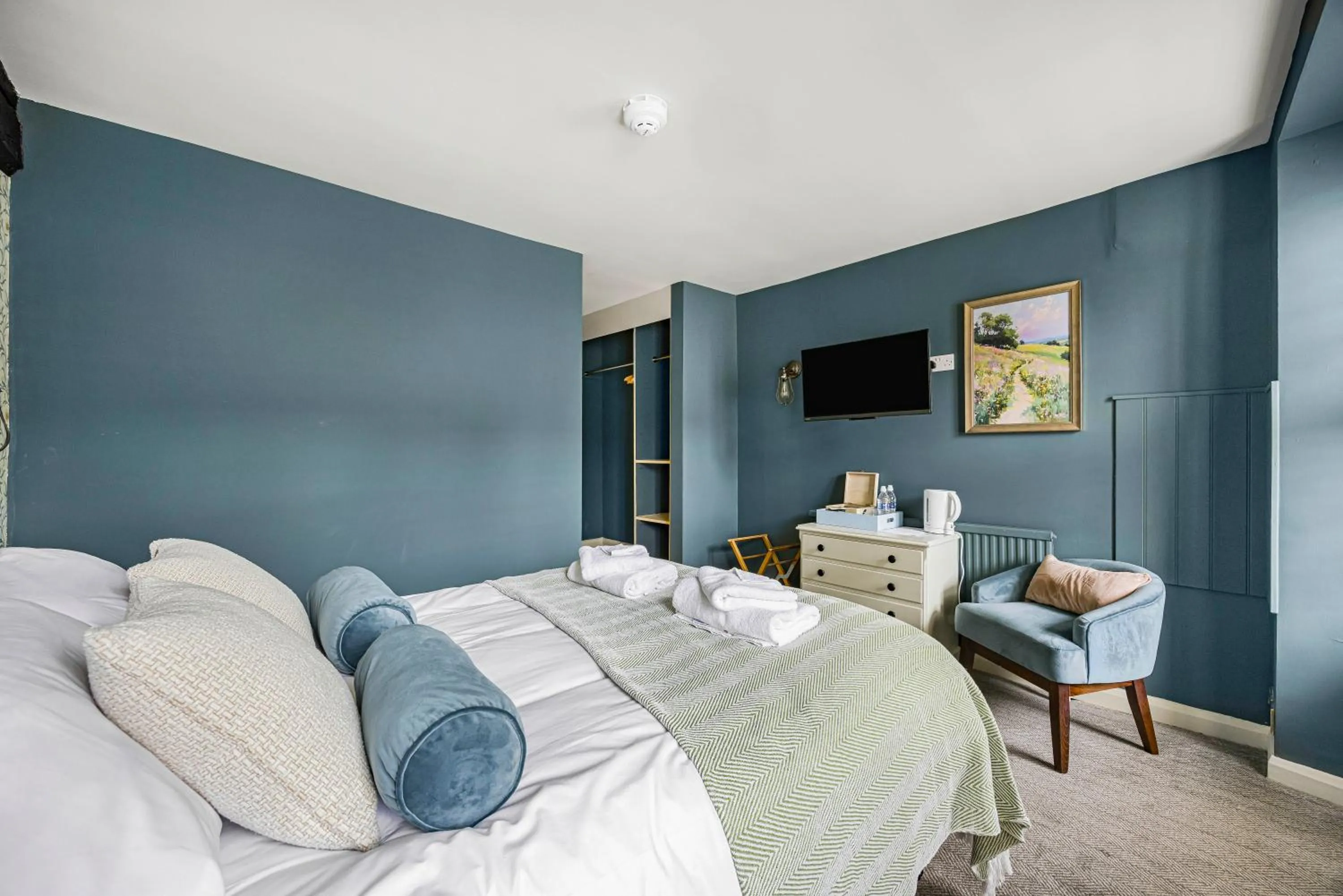 Bed in The Golden Pheasant Inn