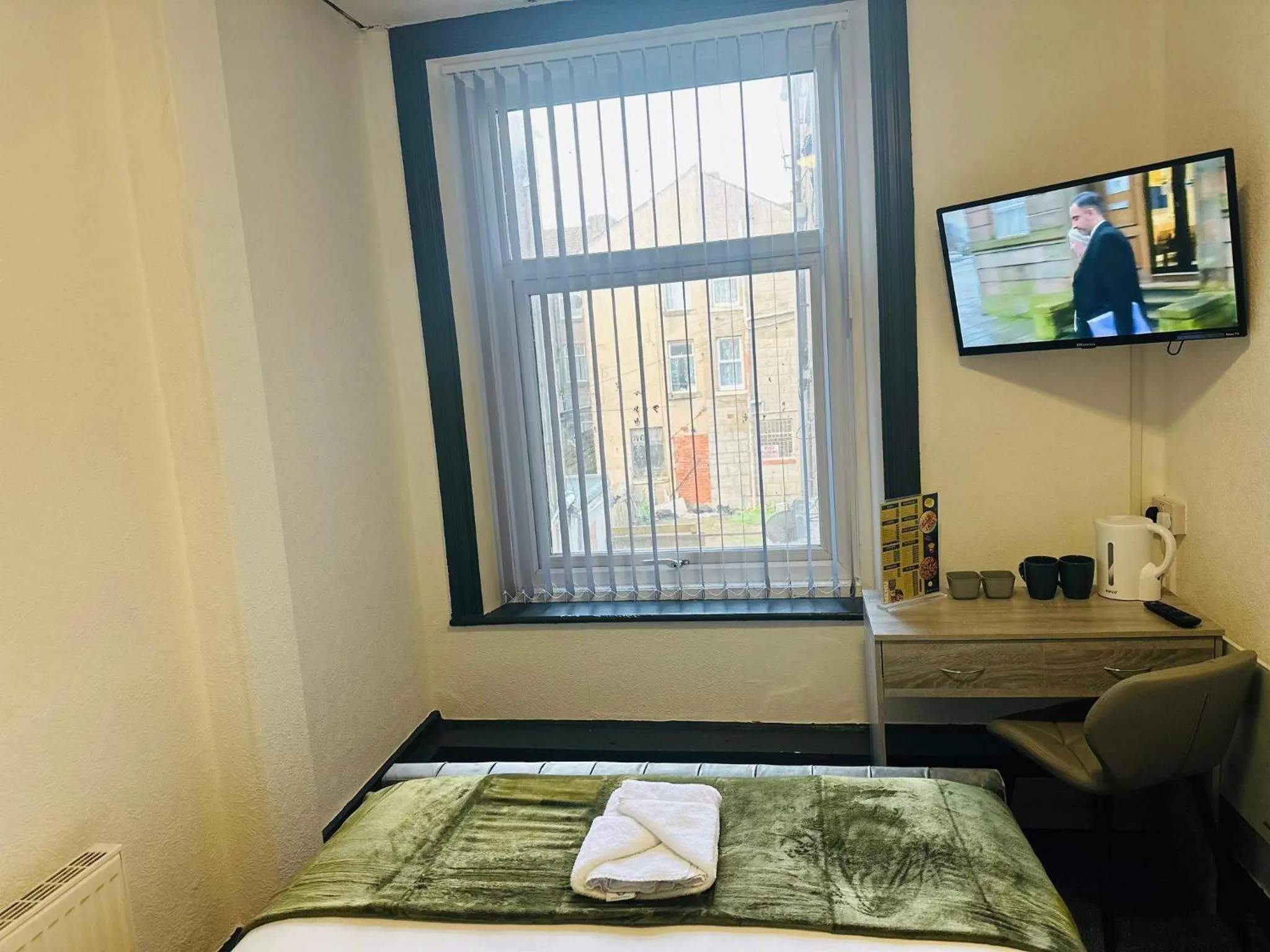 Bedroom, Bed in The New Valron Hotel