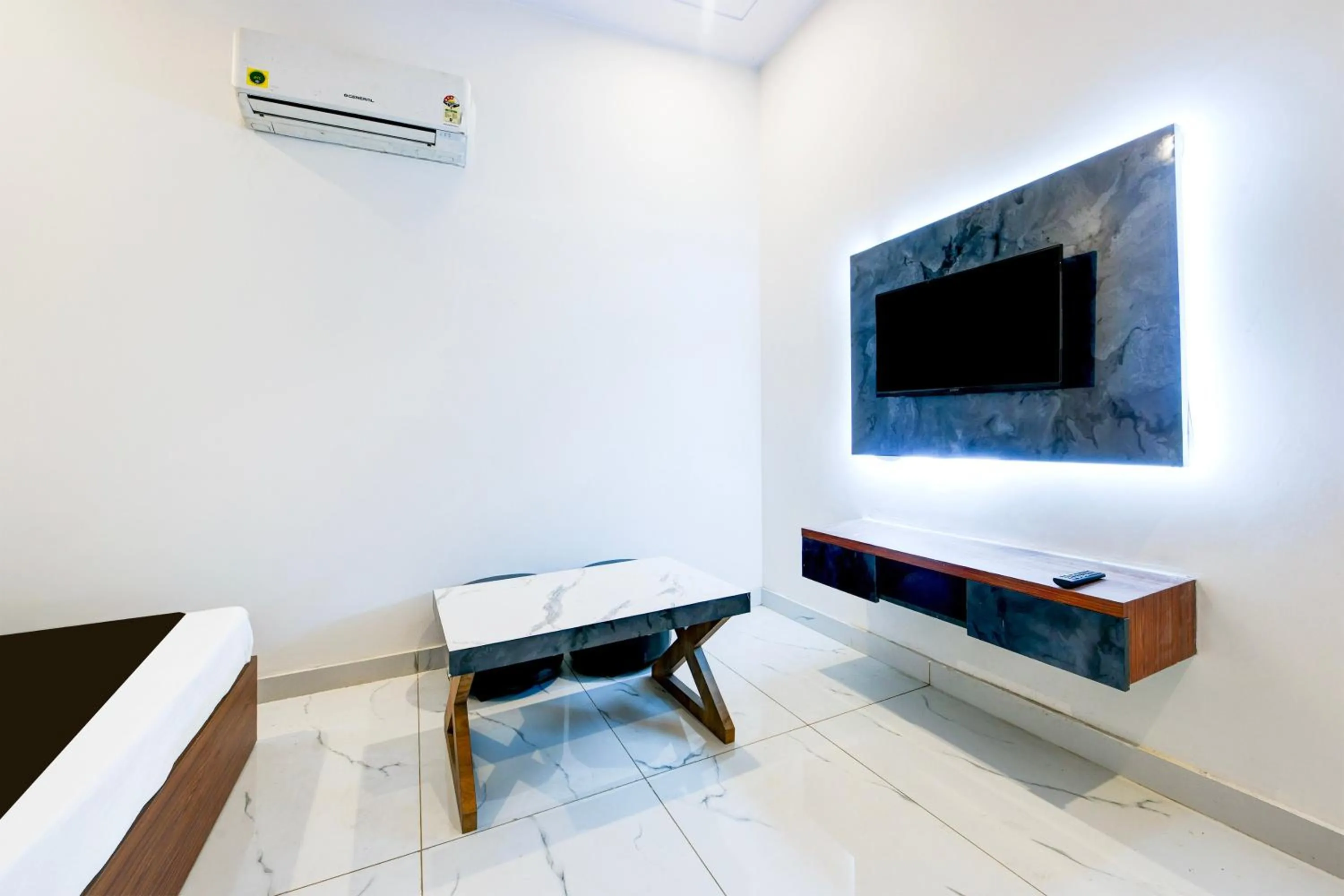 Bedroom in Hotel O Mansha Residency