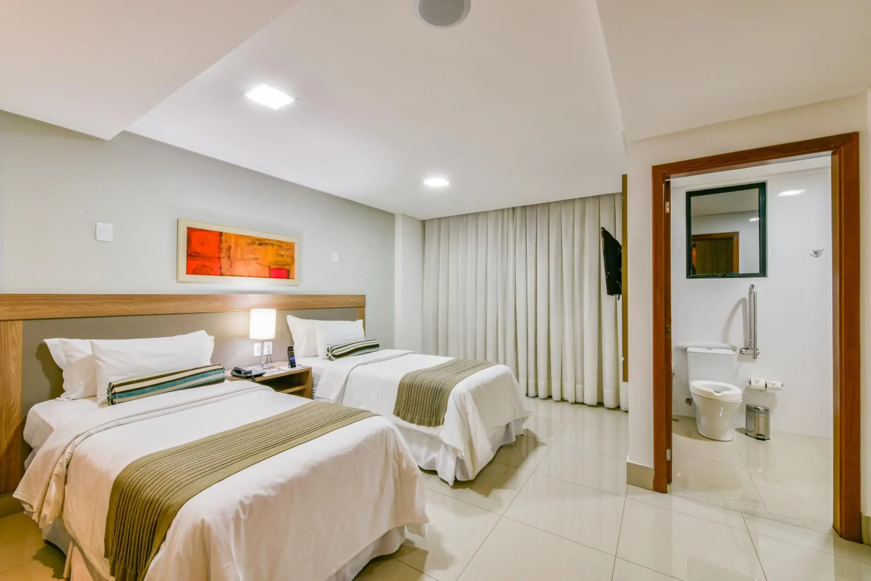 Bedroom, Bed in Plaza Inn Breeze Aeroporto Bedroom, Bed in Plaza Inn Breeze Aeroporto