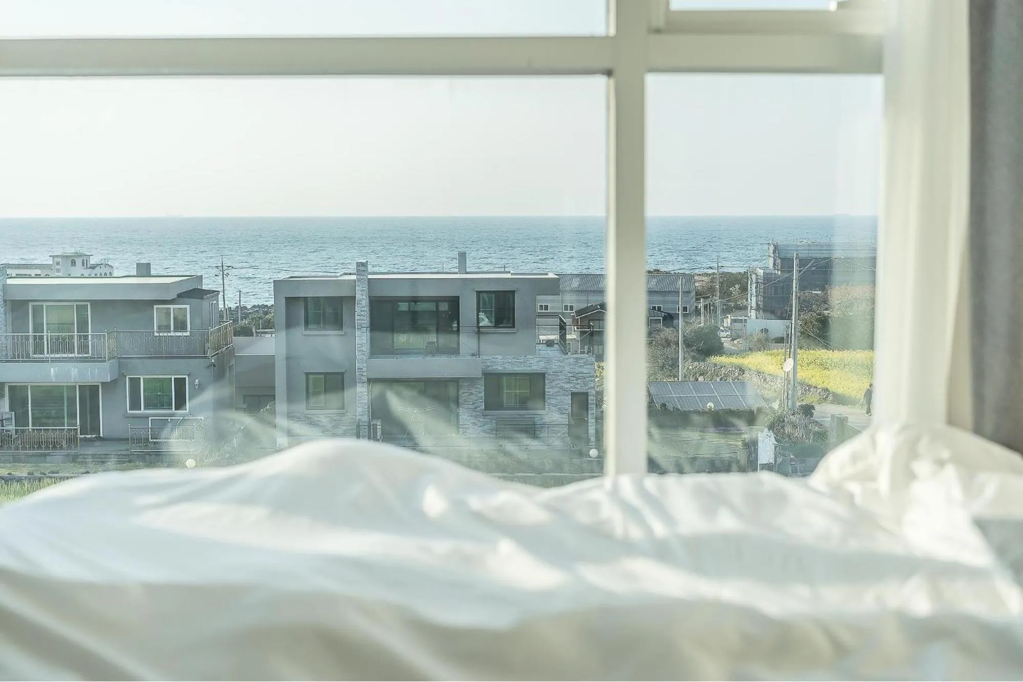 Property building, Bed in Jeju Sky Kids Pension