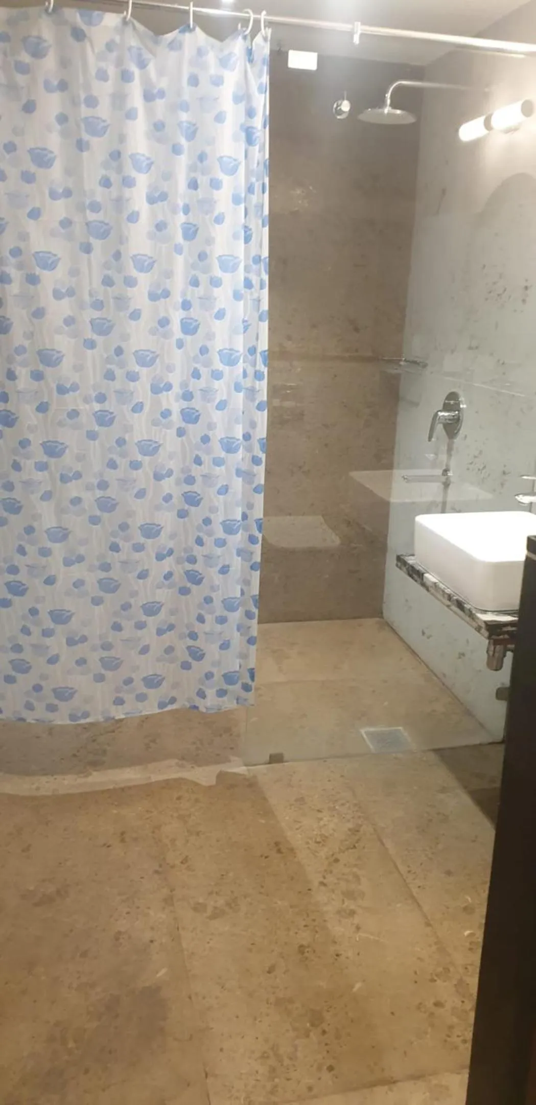 Bathroom in MK Naidu Hotel &Conventions Center