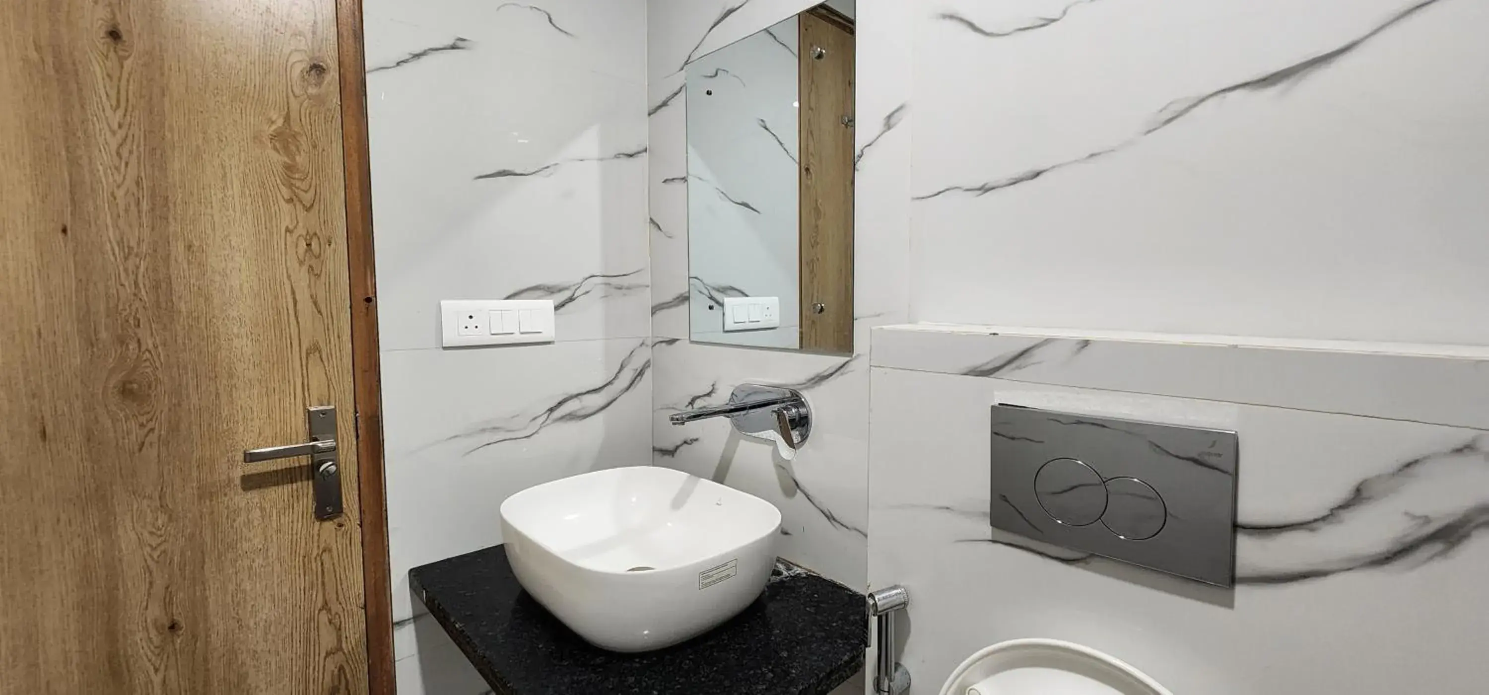 Bathroom in Hotel Shree Sai Dham Bathroom in Hotel Shree Sai Dham