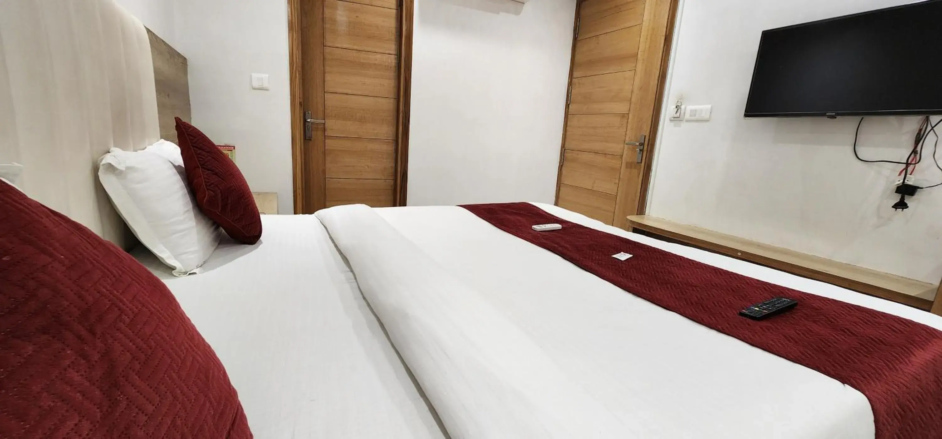 Bed in Hotel Shree Sai Dham Bed in Hotel Shree Sai Dham