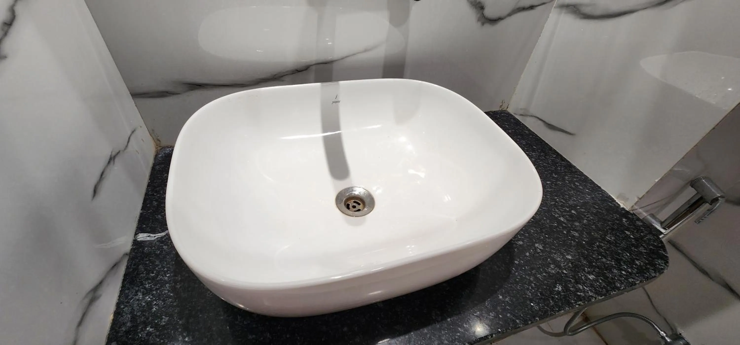 Bathroom in Hotel Shree Sai Dham