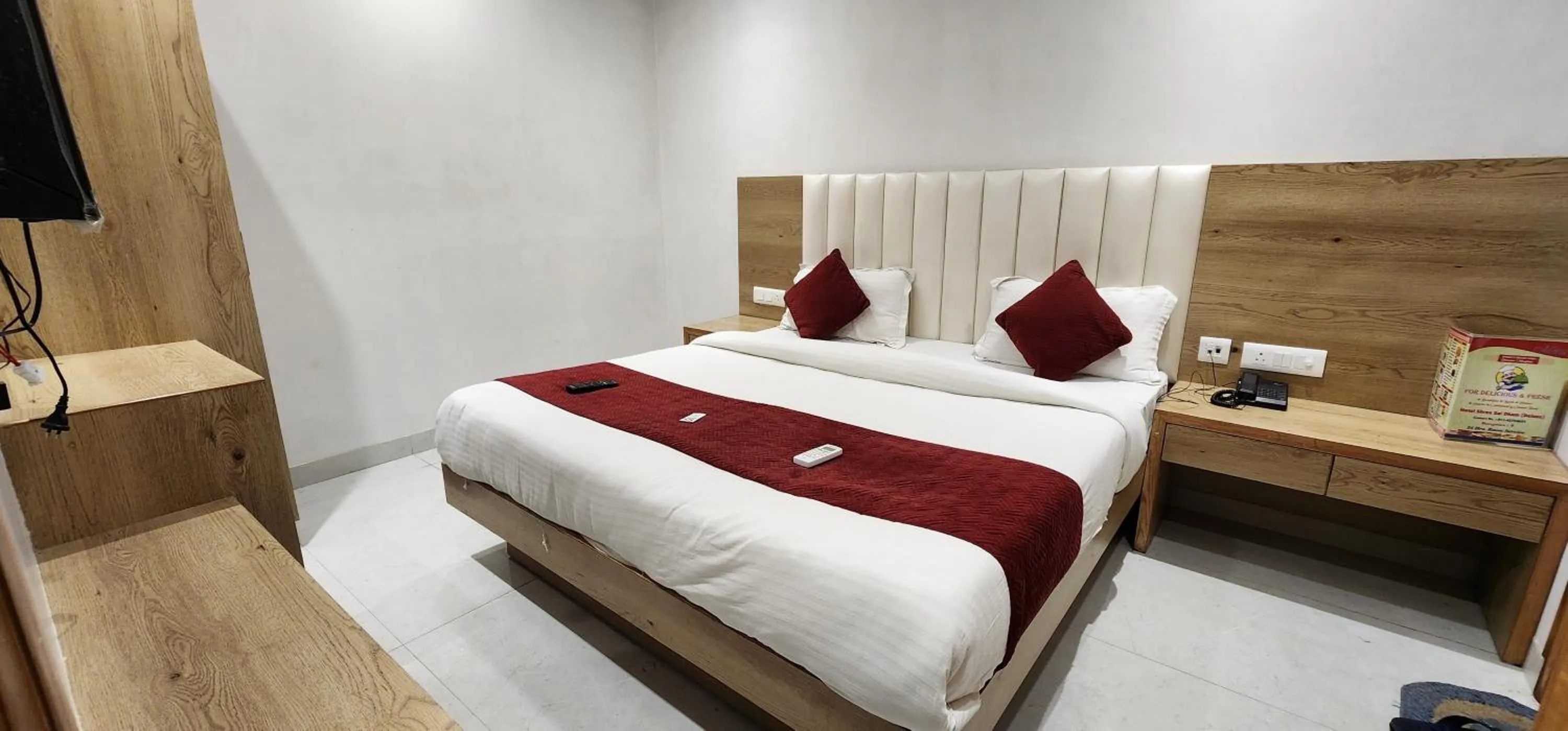 Bed in Hotel Shree Sai Dham