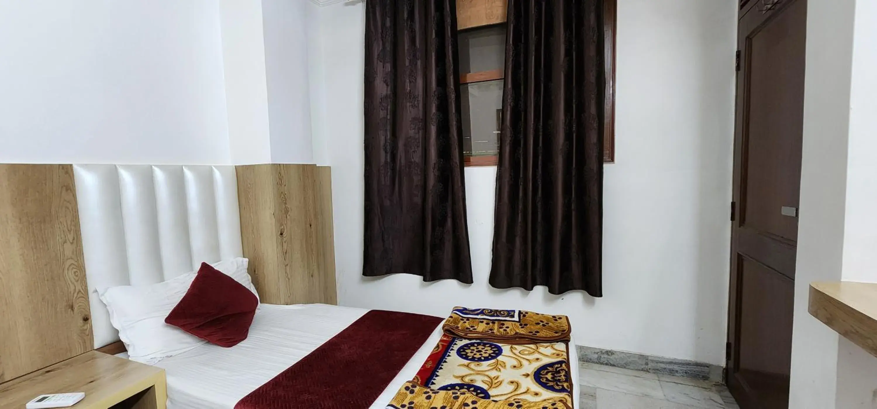 Bed in Hotel Shree Sai Dham Bed in Hotel Shree Sai Dham