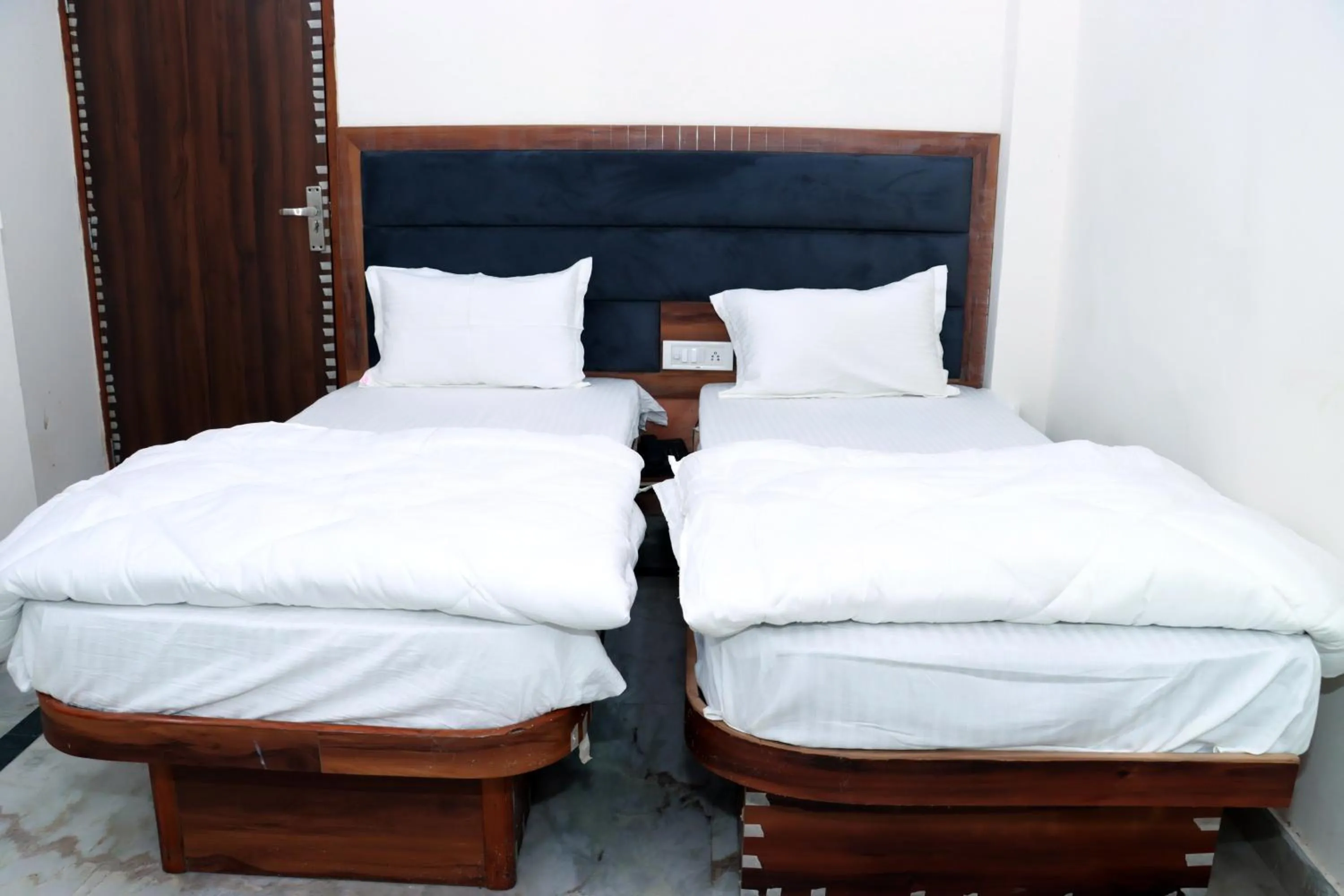 Bed in Hotel Gush At New Delhi Railway Station