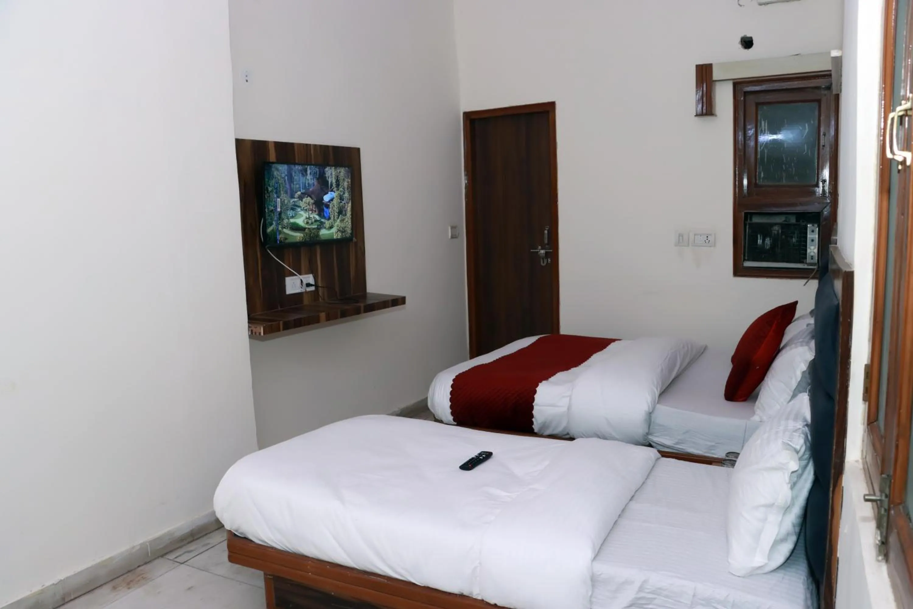 Bed in Hotel Gush At New Delhi Railway Station