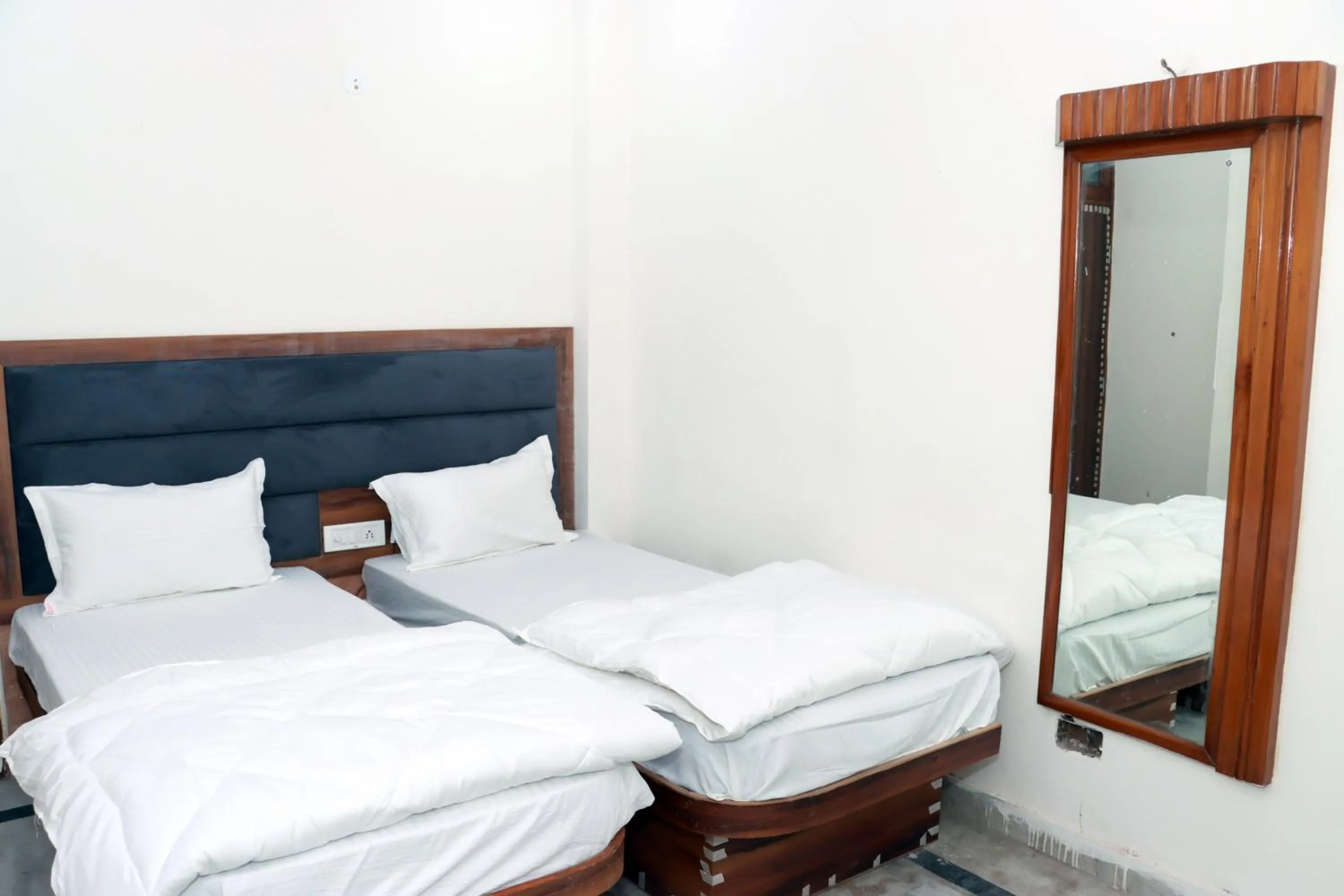 Bed in Hotel Gush At New Delhi Railway Station