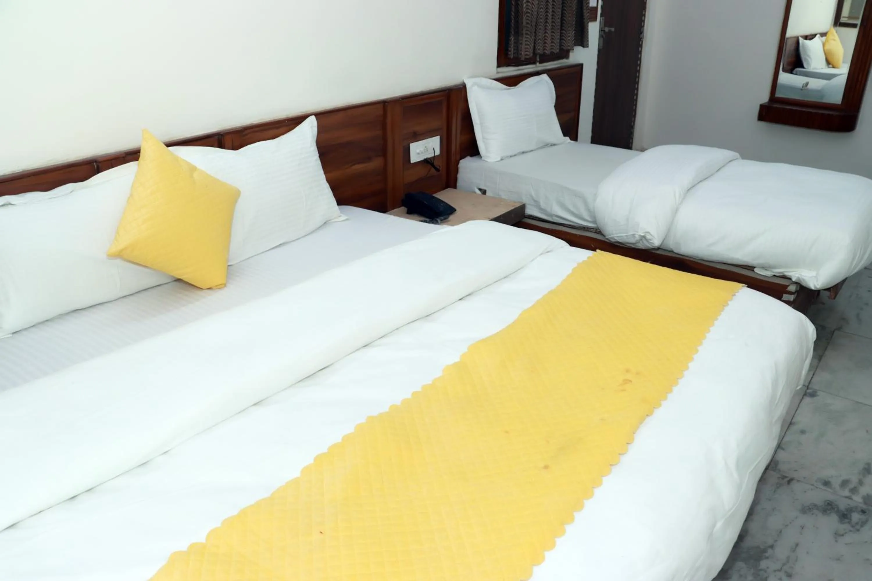 Bed in Hotel Gush At New Delhi Railway Station