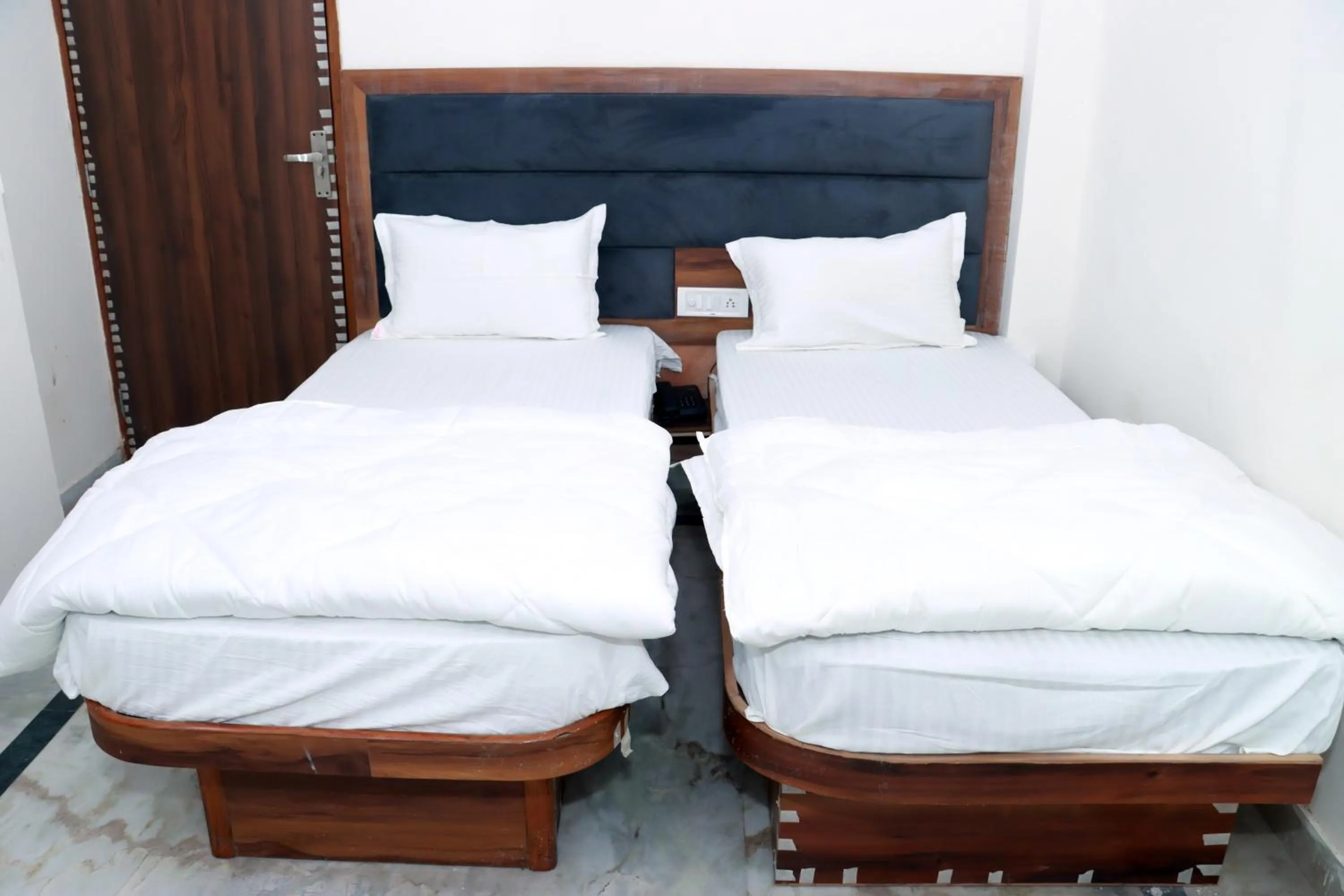 Bed in Hotel Gush At New Delhi Railway Station