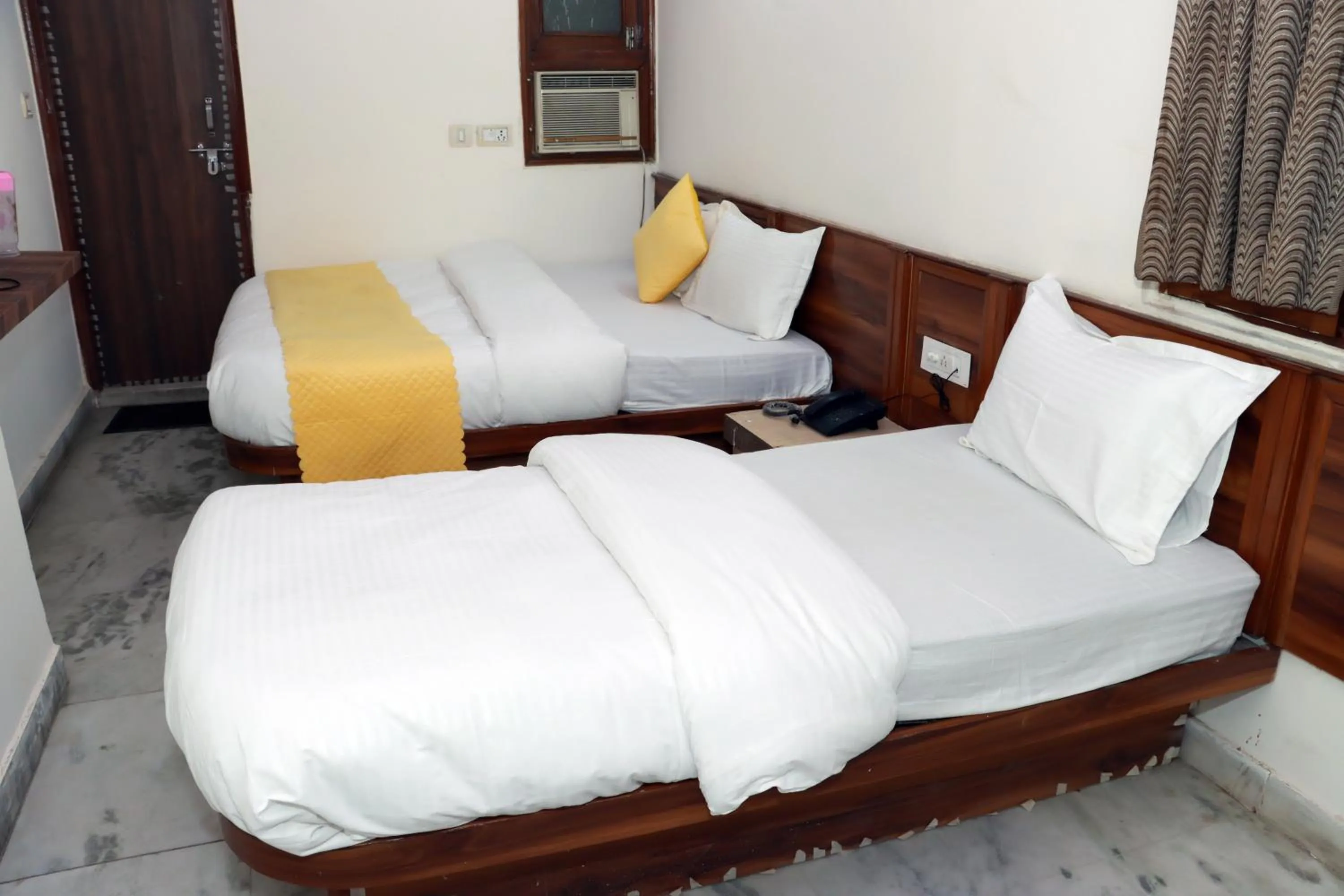 Bed in Hotel Gush At New Delhi Railway Station