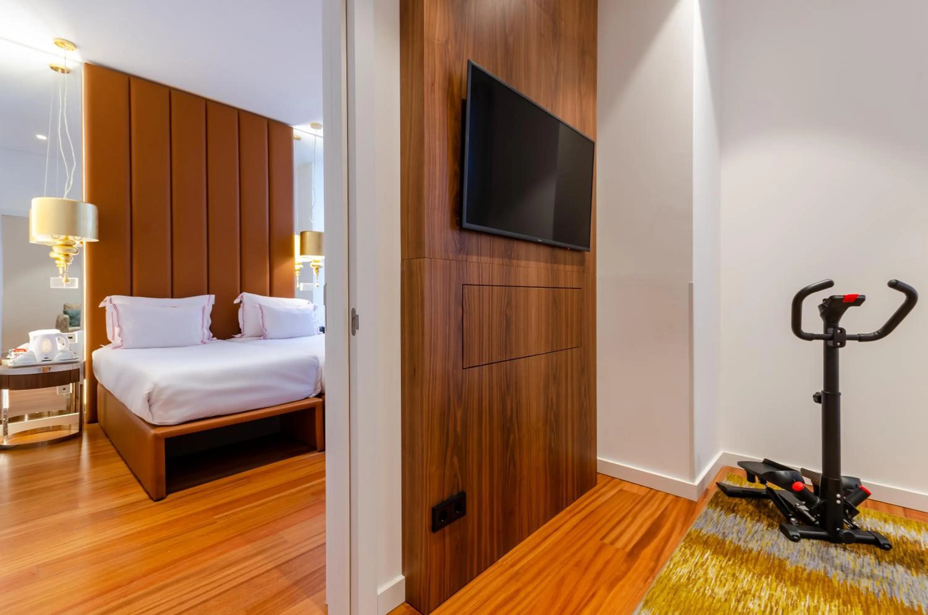 Communal lounge/ TV room, Bed in The 7 Hotel, Suites, Studios & Apartments