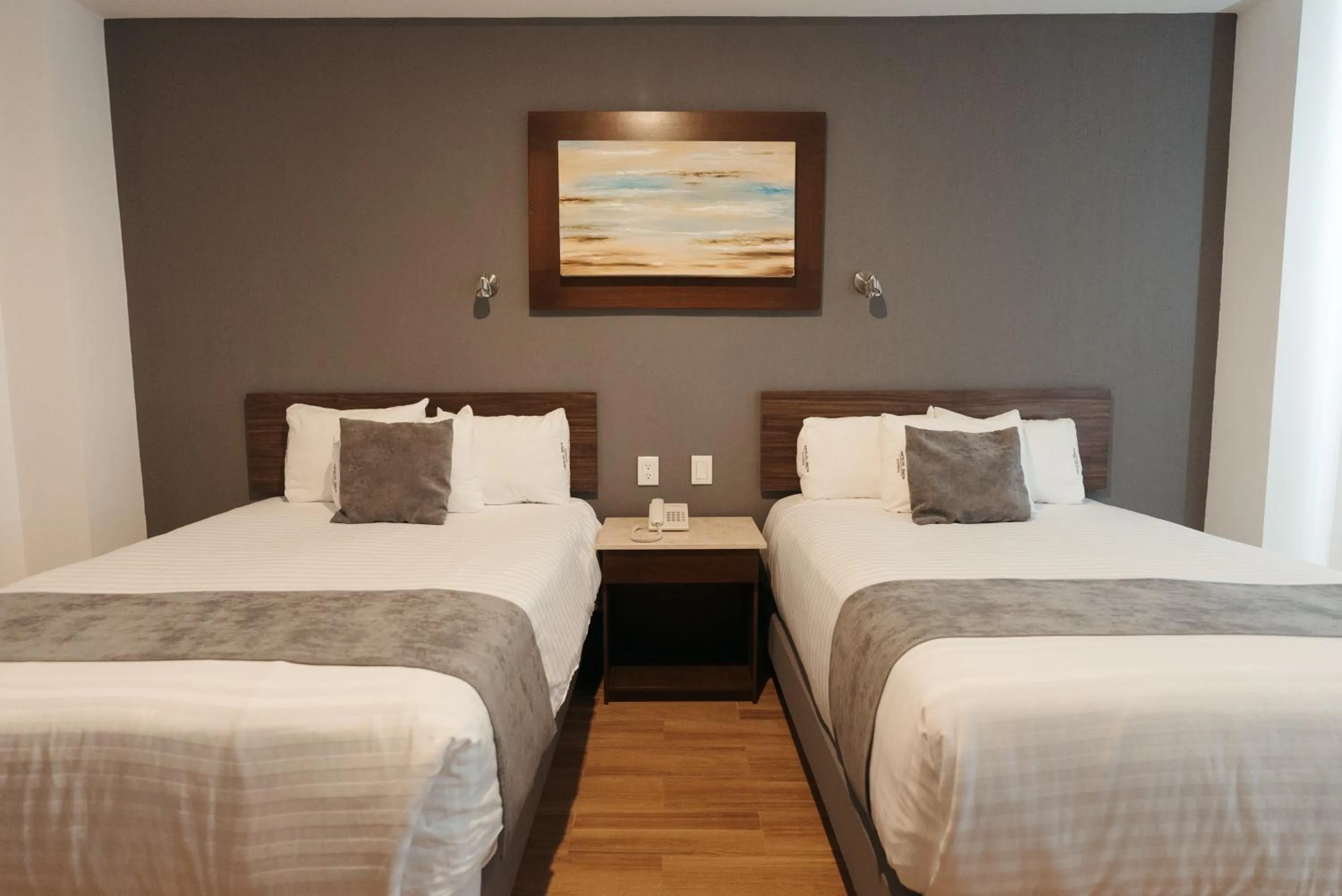 View (from property/room), Bed in Hoteles Unico Express