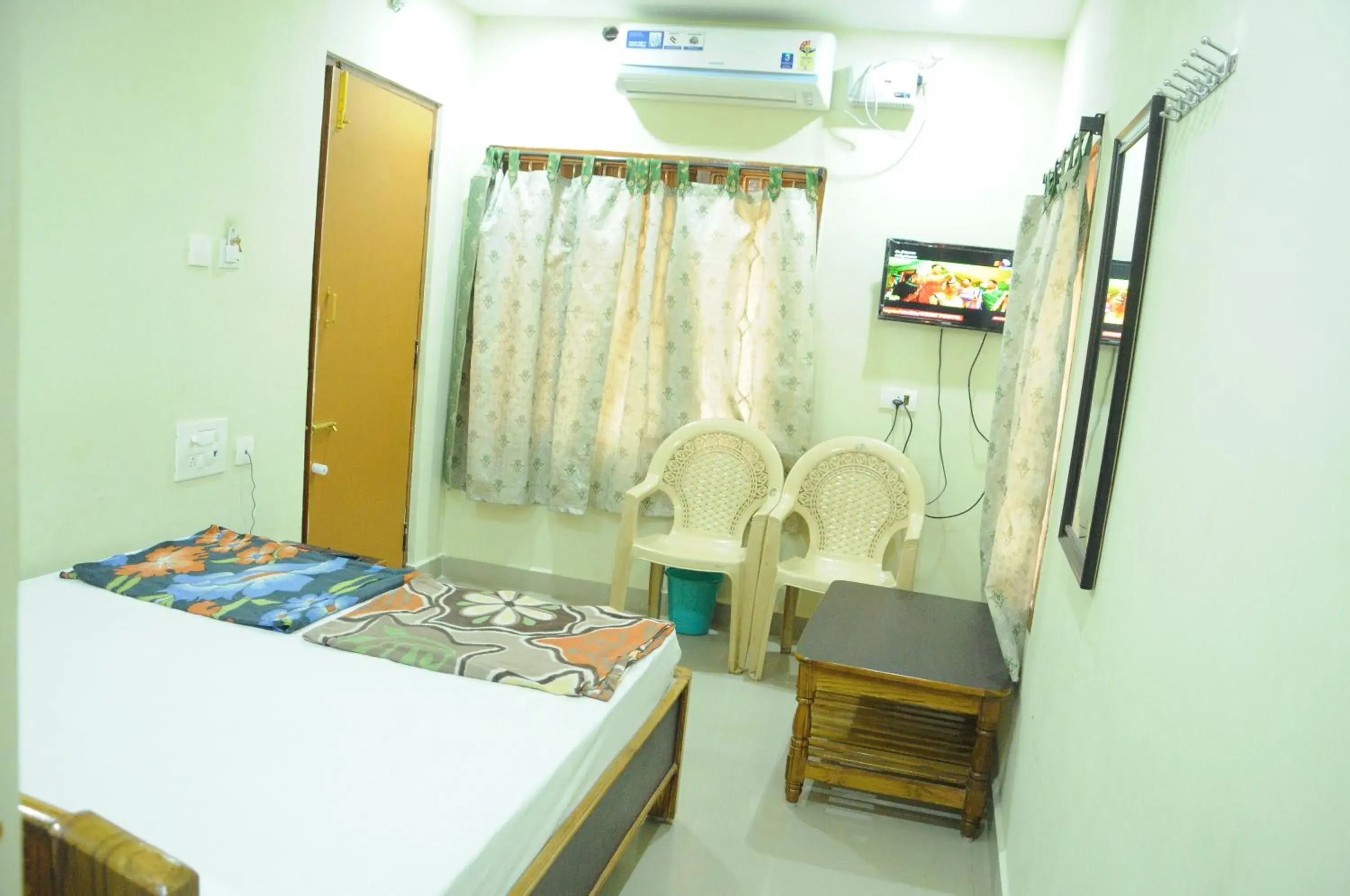 Photo of the whole room, Bed in Hotel Agarala Residency Photo of the whole room, Bed in Hotel Agarala Residency