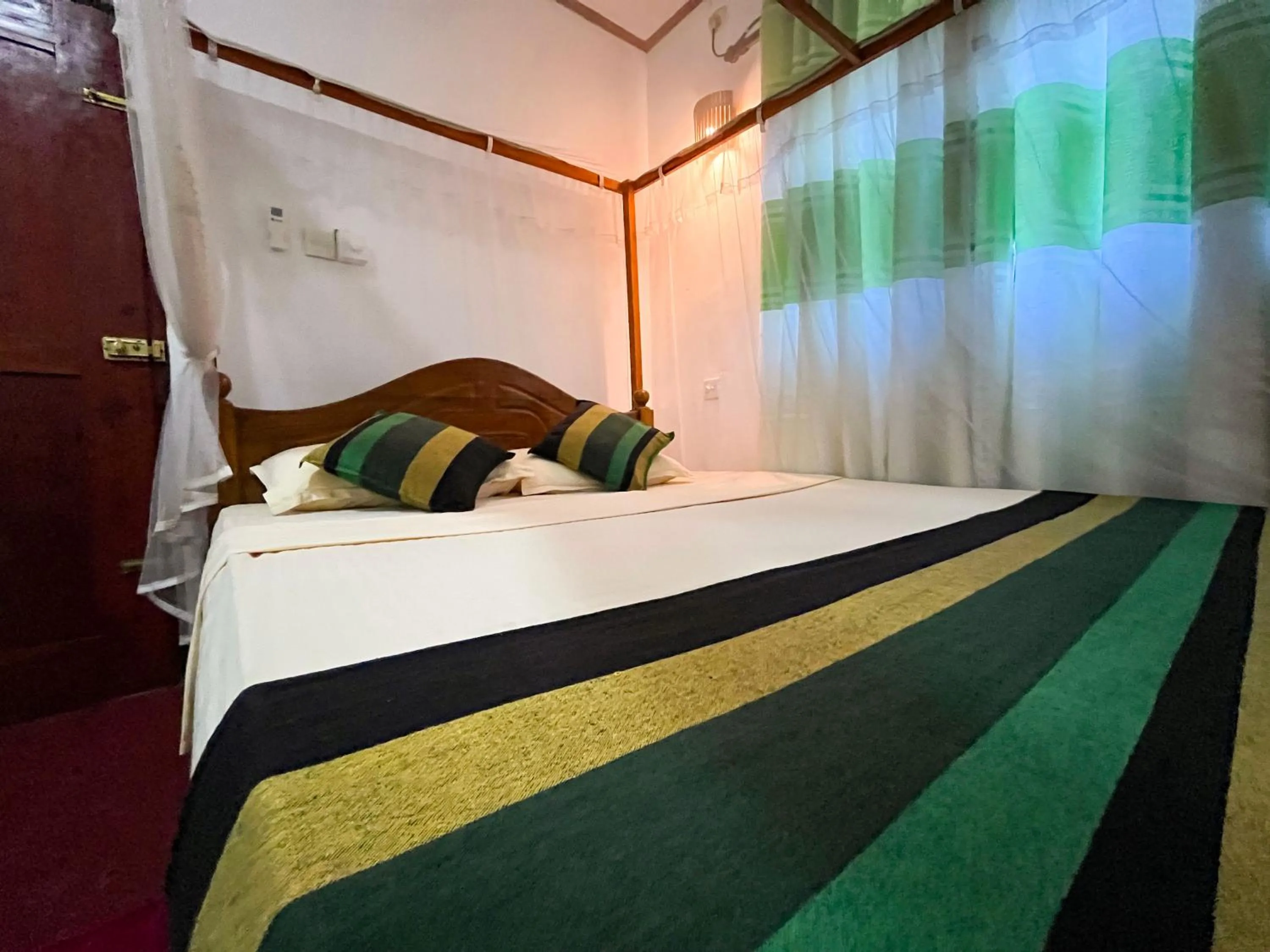 Bed in Damith Tourist Inn