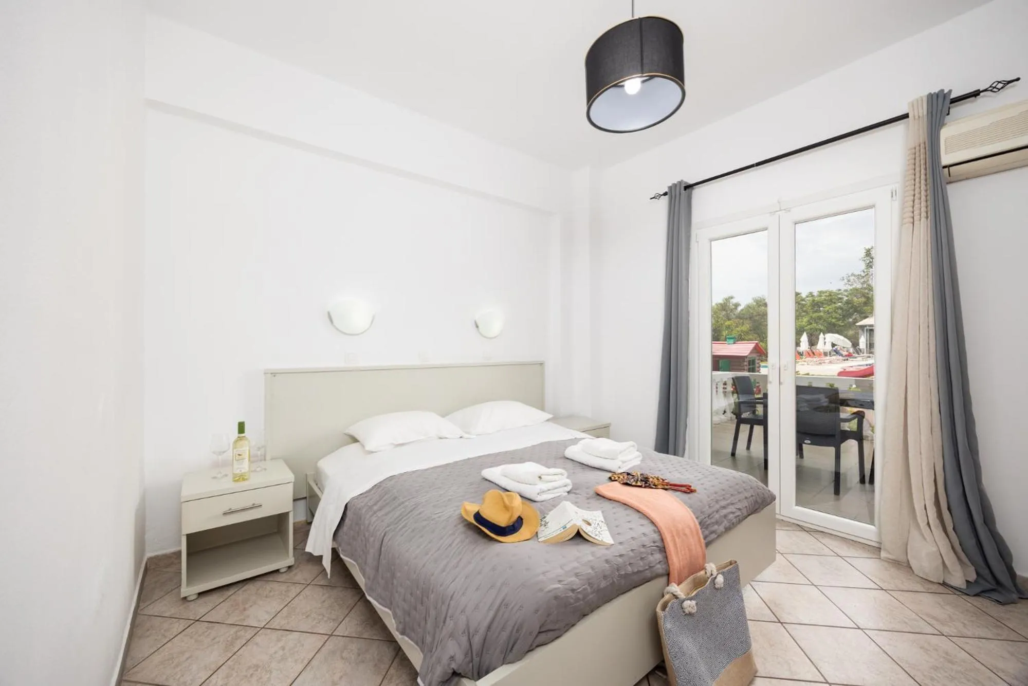 Bed in Kosmas Apartments